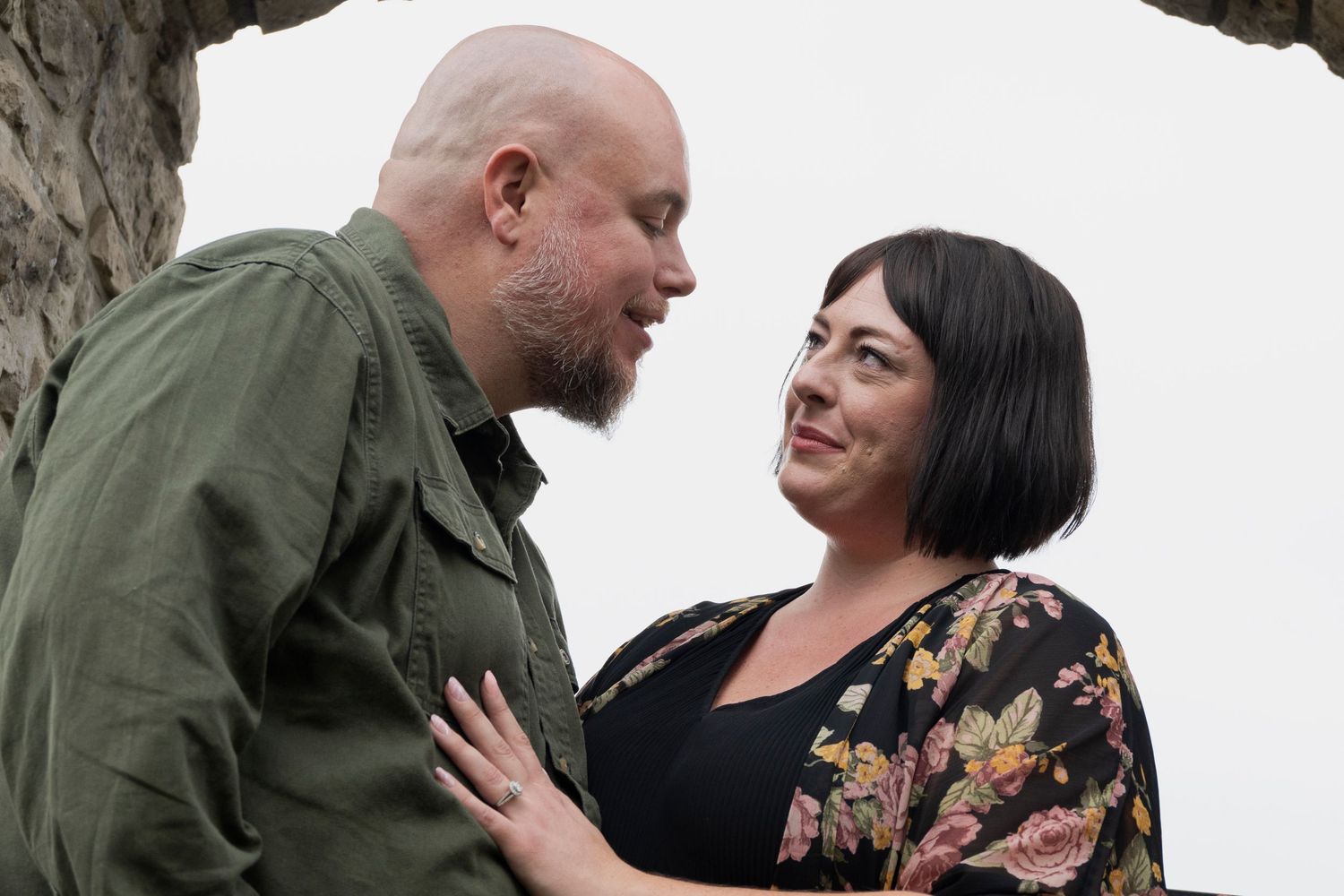 Sweet moments shared between a couple during their engagement photoshoot.