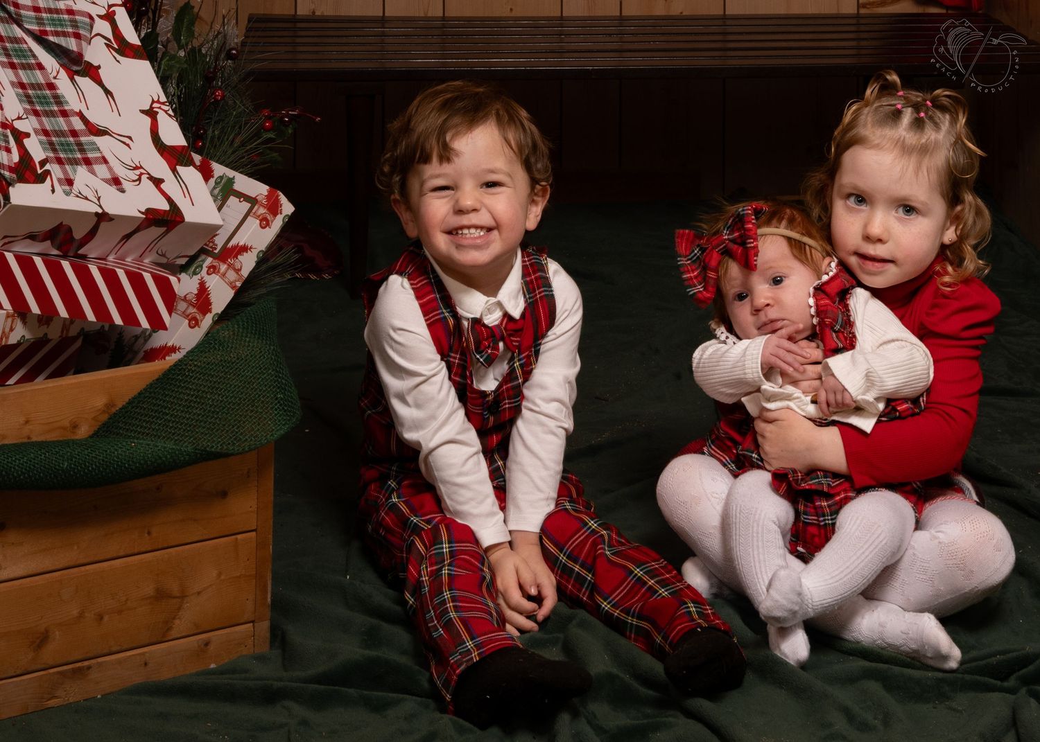 Children in festive red and white outfits posing for Christmas photos.