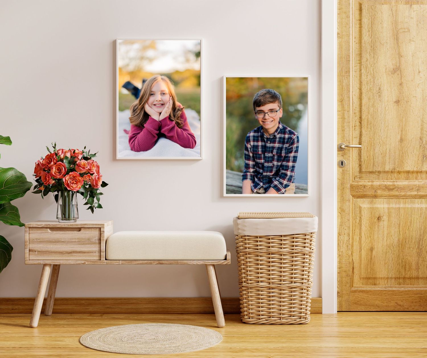 Greensboro, NC Family Photographer.  Ryan Harden.  Reidsville, NC.  Two framed images hung in entry way of siblings at lake in the fall.