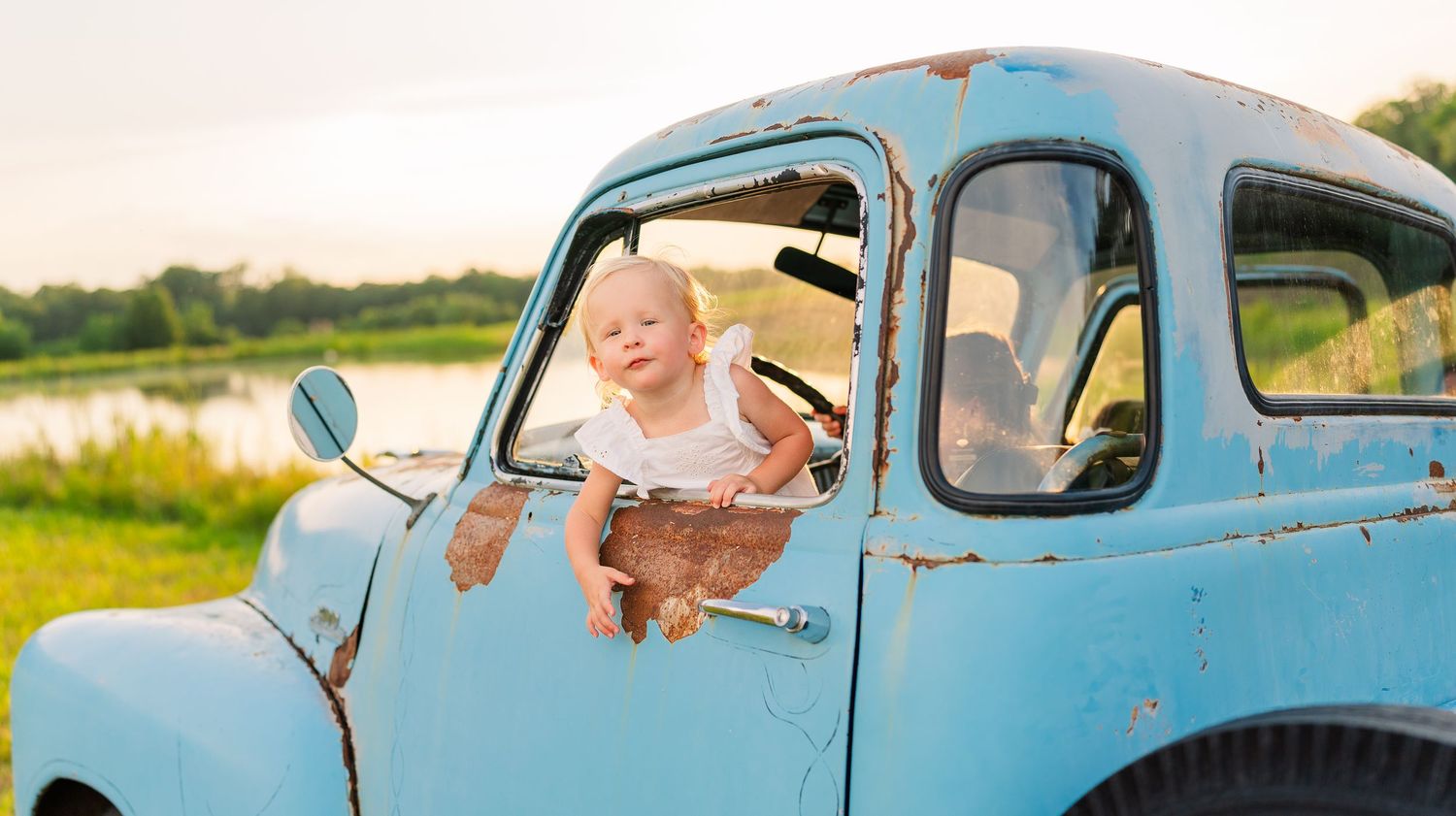 Greensboro, NC Family Photographer, Ryan Harden, Reidsville NC, happy family in blue old truck