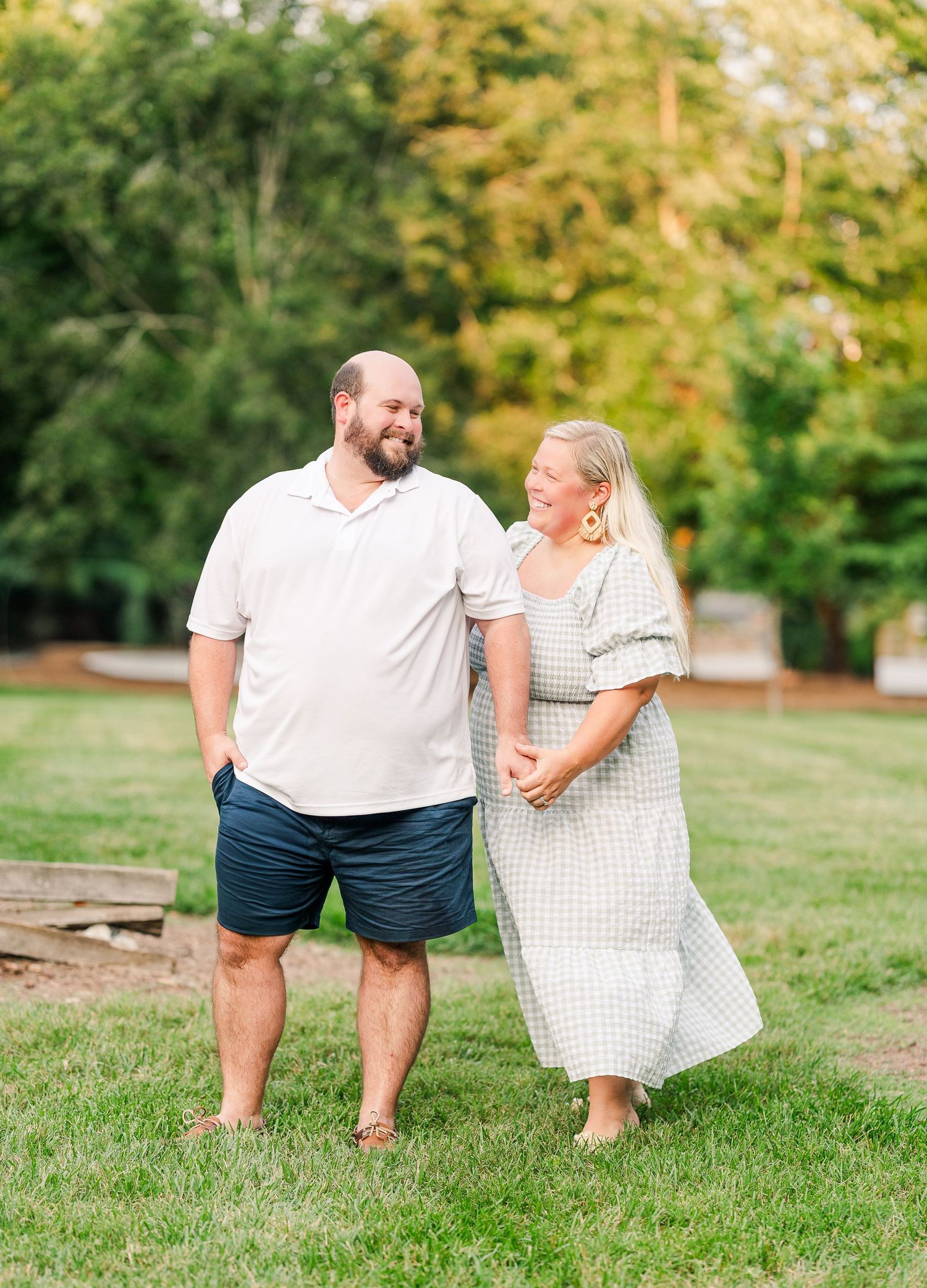 Greensboro, NC Family Photographer, Ryan Harden, Reidsville NC.  Mom and Dad holding hands.