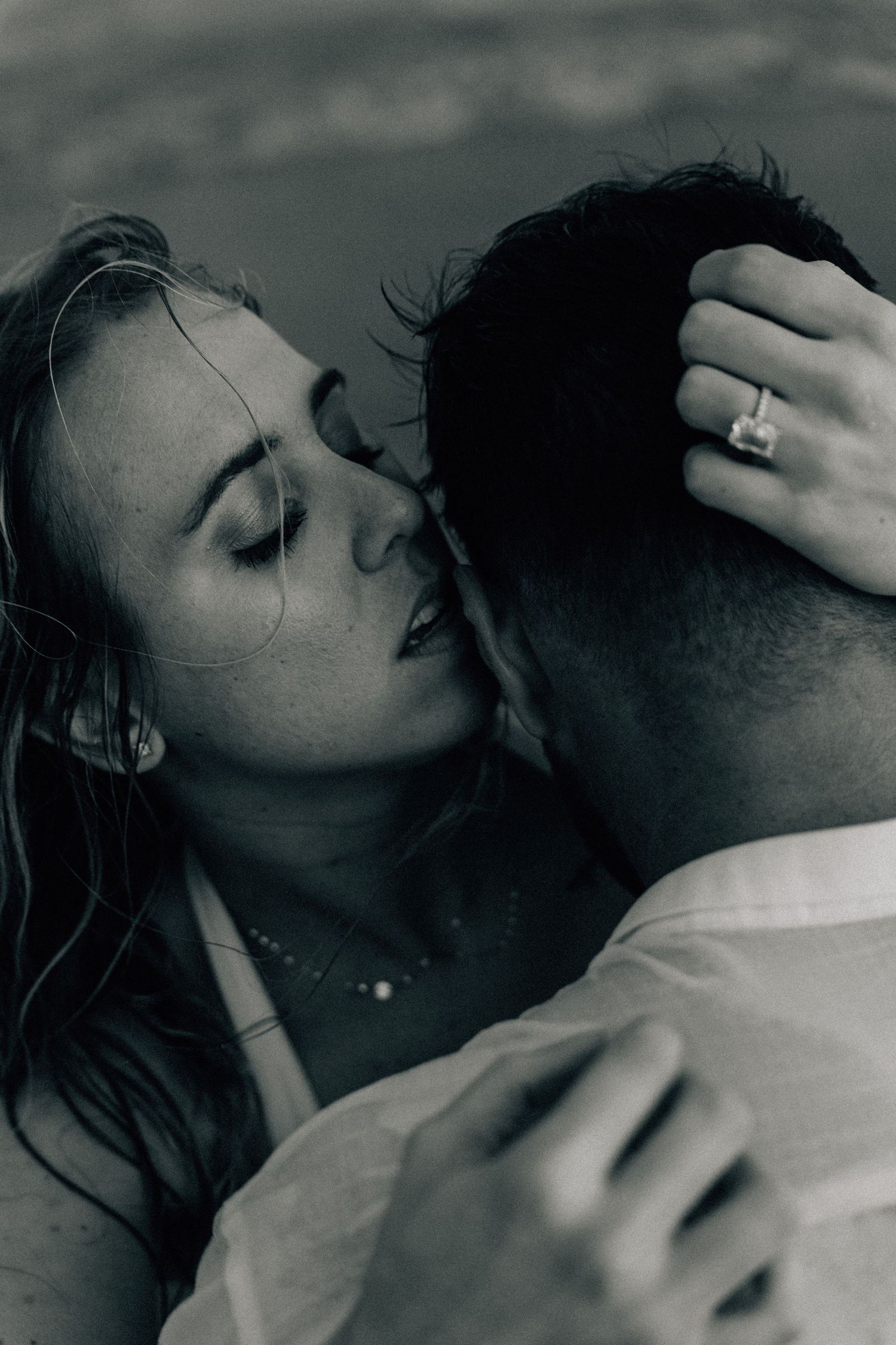 Black and white intimate portrait series showing tender romantic moments.