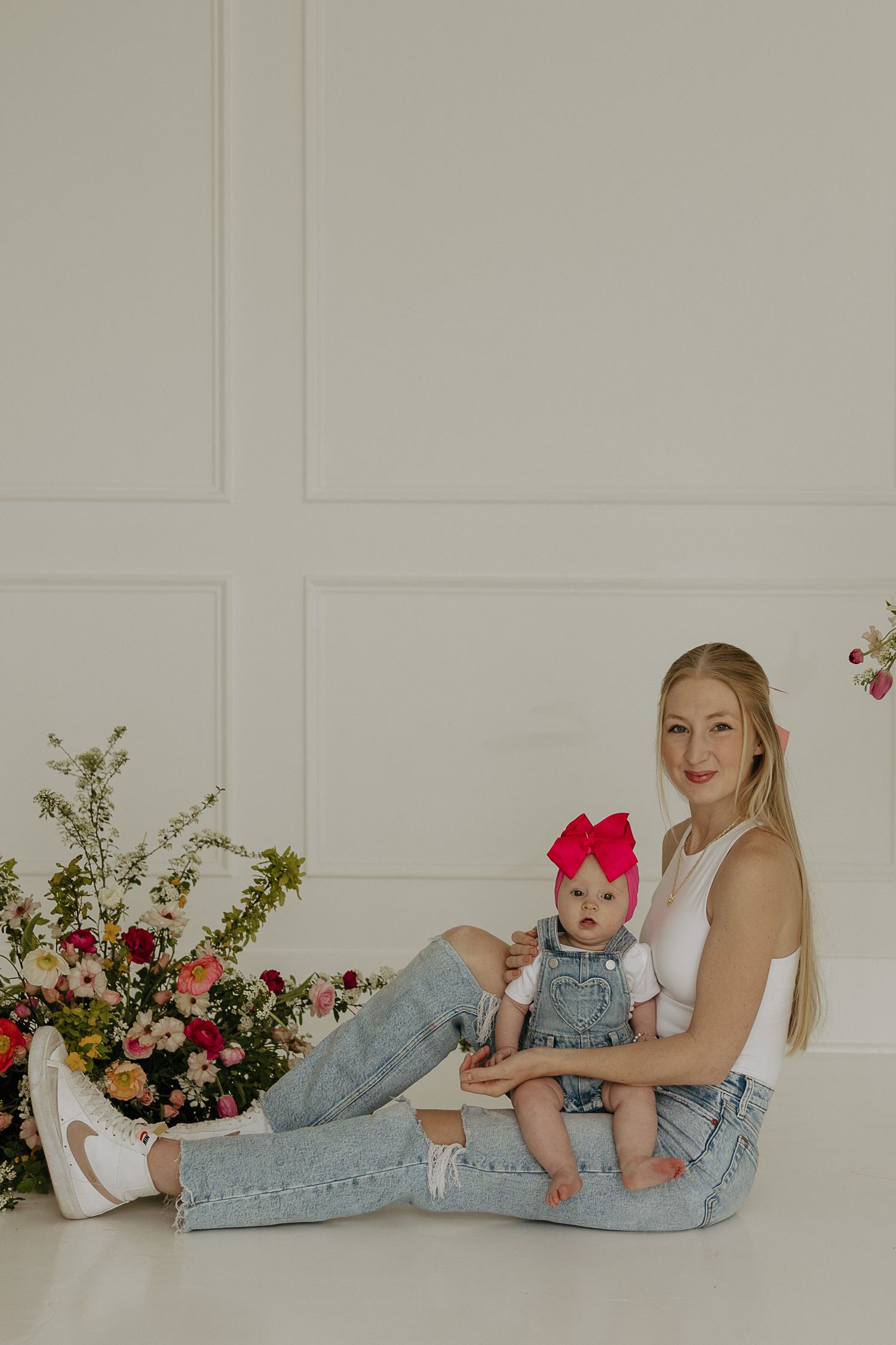 Casual lifestyle photos featuring matching denim outfits and a floral arrangement in the background.
