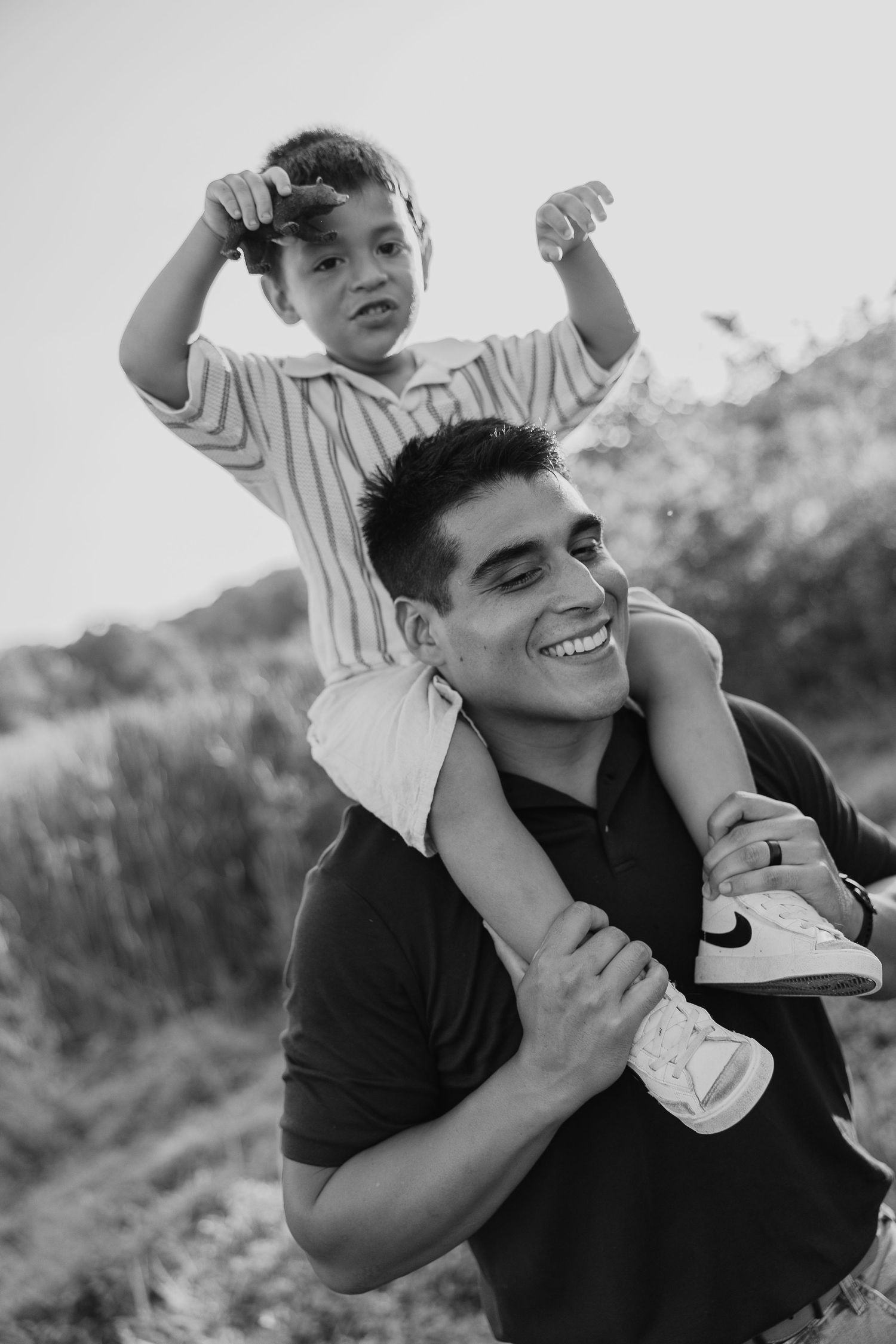Playful black and white sequence showing joyful interactions outdoors.