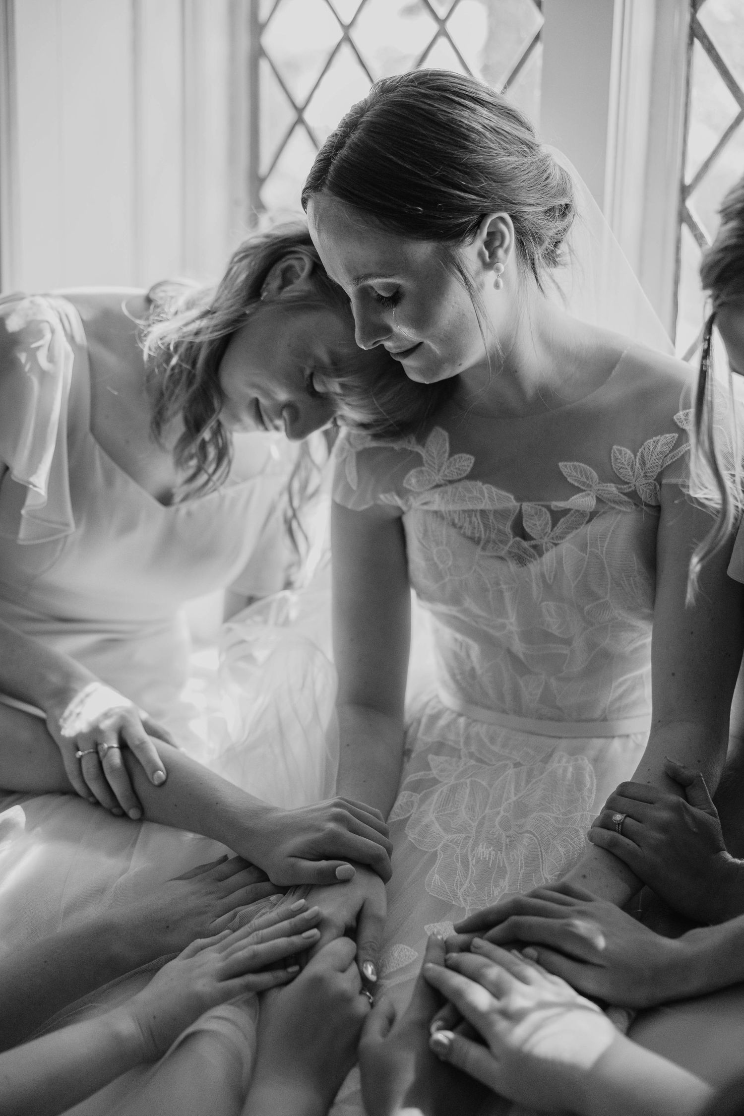 Black and white photo series showing preparations for a special occasion in natural window light.