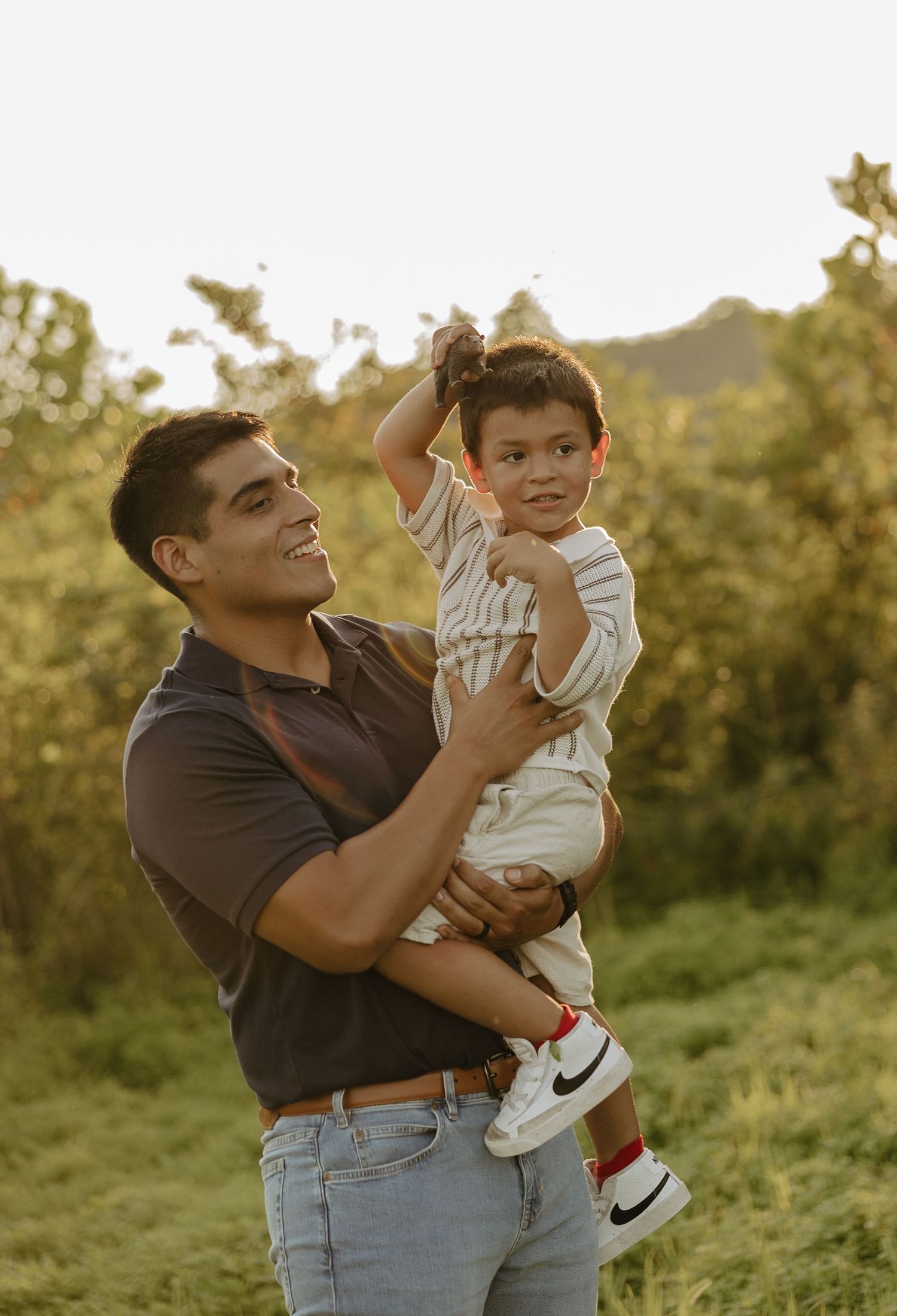 Tender family moments captured in golden evening light.