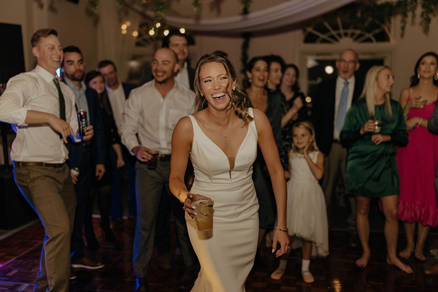 A sequence of wedding reception photos showing dancing, celebration and joy on the dance floor at an evening event.