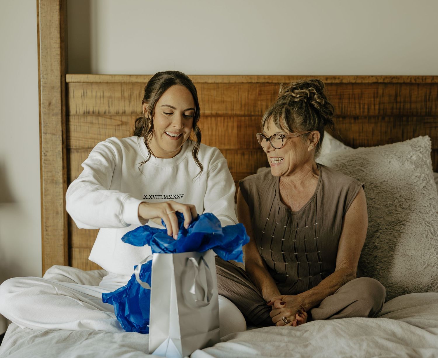 A series of candid moments showing wedding preparation details in warm, natural lighting.