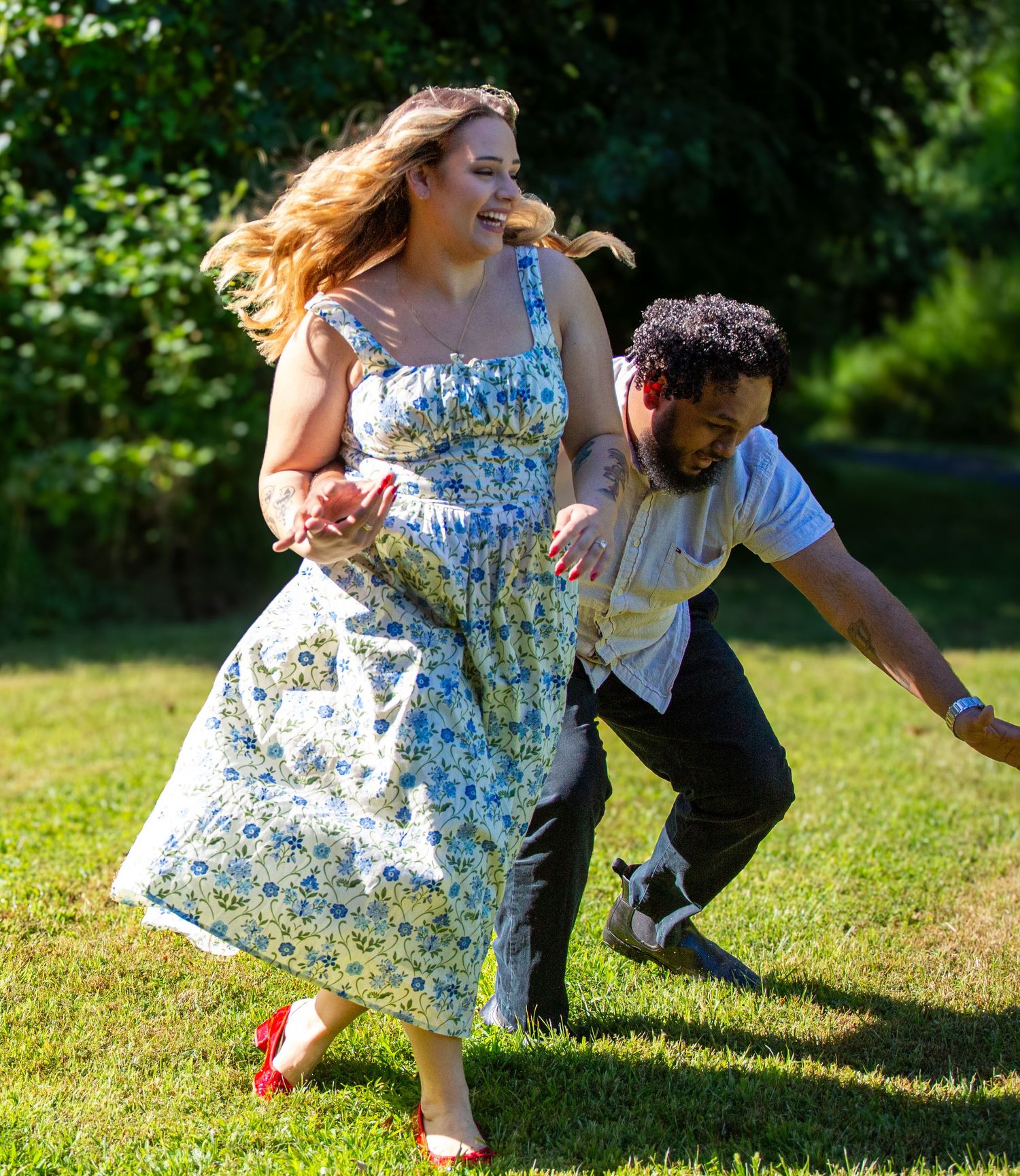 A whimsical dance sequence in a summer garden featuring a floral dress and joyful movement.