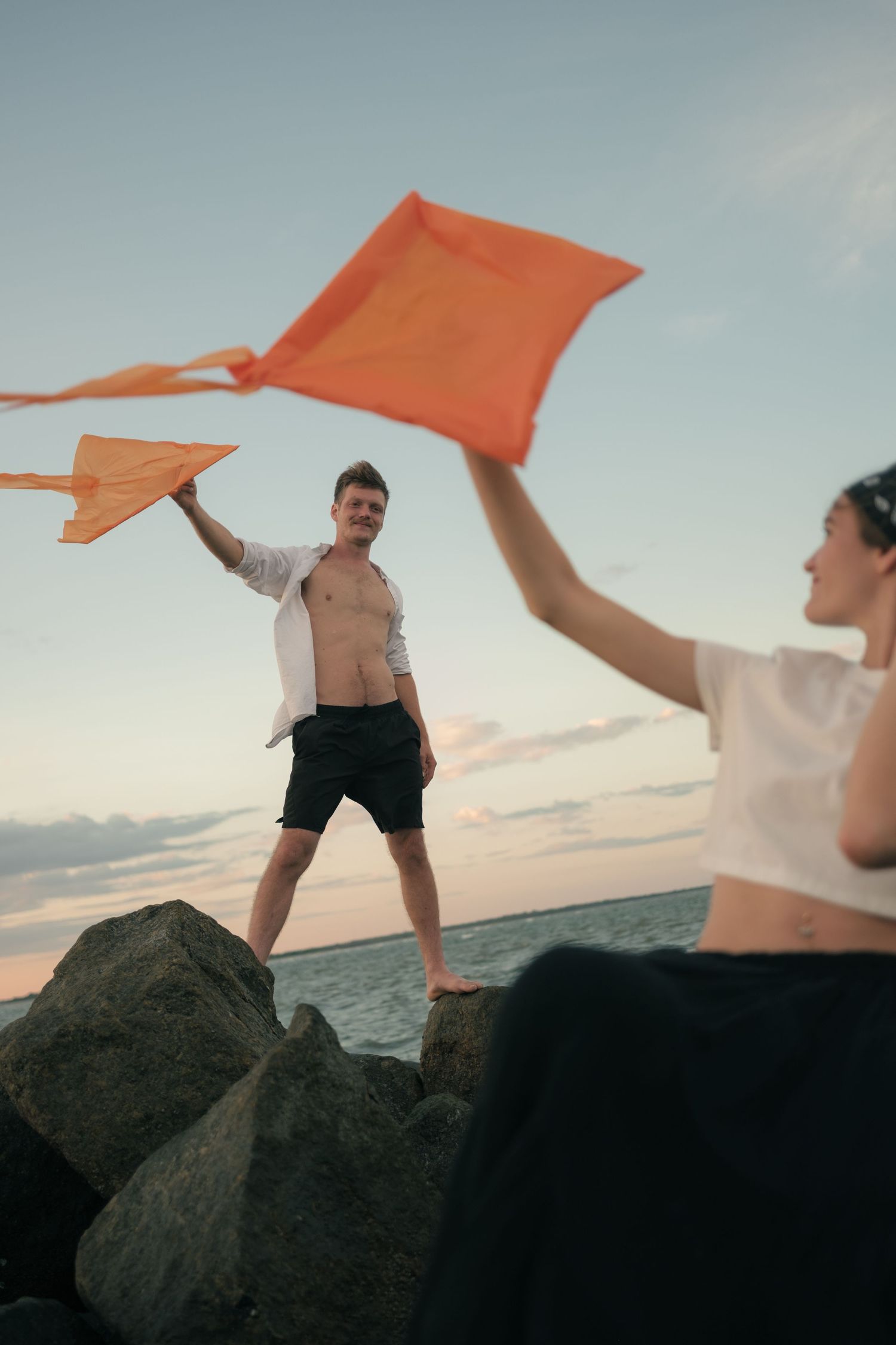 Charleston sunset beach session at Folly beach with kites of a couple