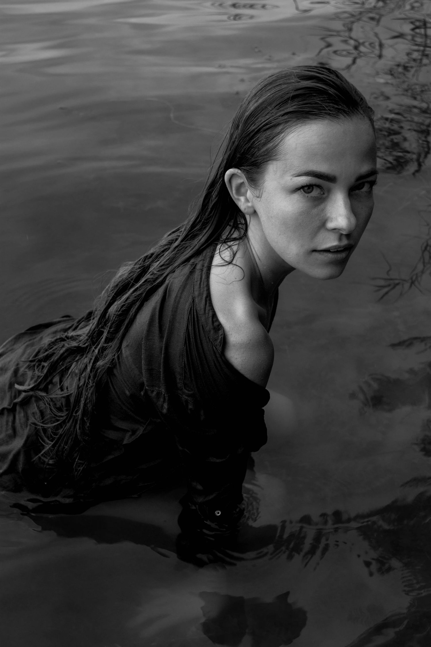 Black and white portrait of a woman in water, Hyde Park, London, UK