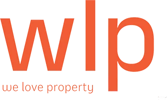 Modern corporate logo design with 'wlp' in orange letters and tagline 'we love property' underneath.