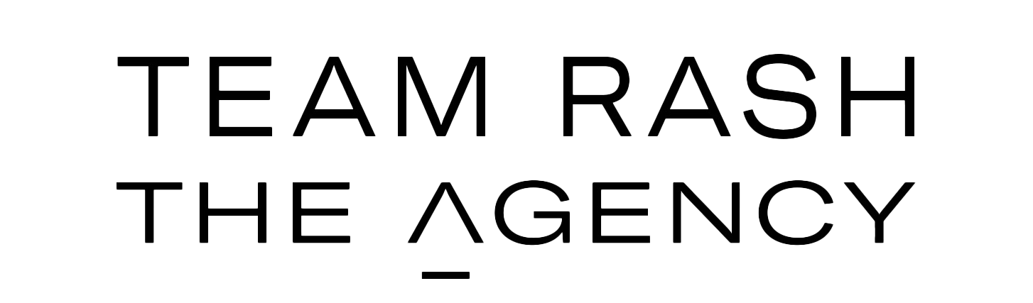 Black text reading 'TEAM RASH THE AGENCY' set against a white background.