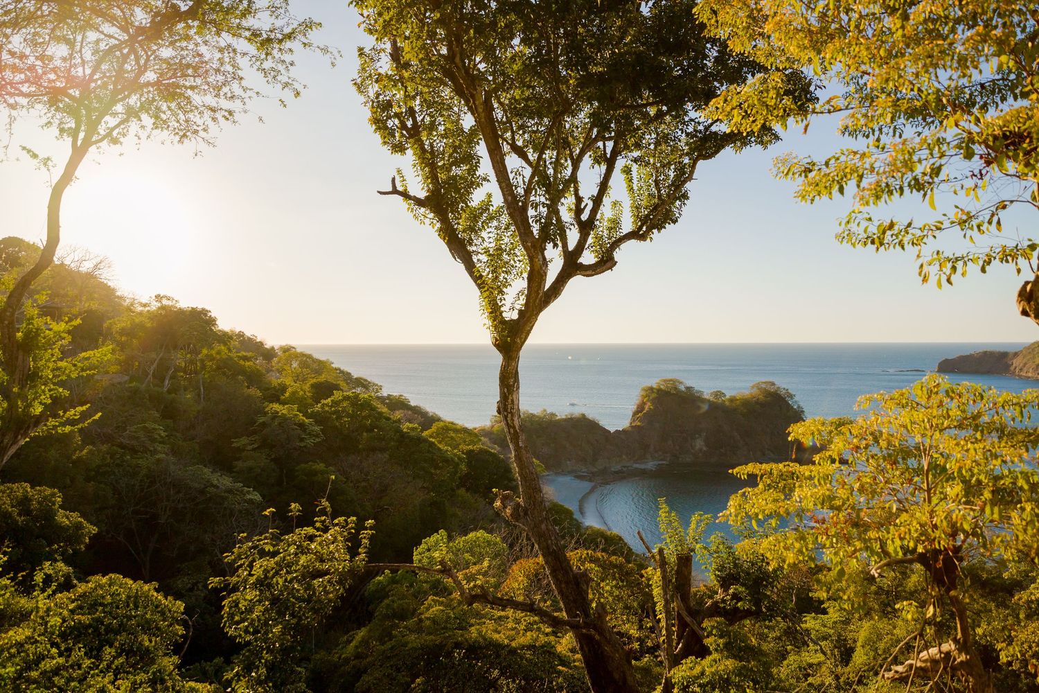 Sunset view over Peninsula Papagayo during an engagement session at Nekajui, Costa Rica.