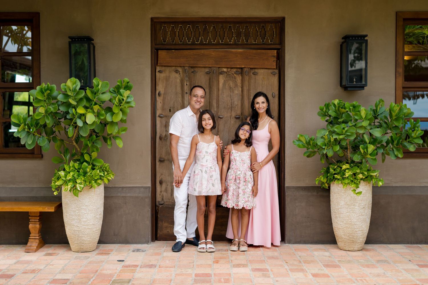 Family of four during a vacation photography session at Nekajui, a Ritz-Carlton Reserve in Peninsula Papagayo, Costa Rica.