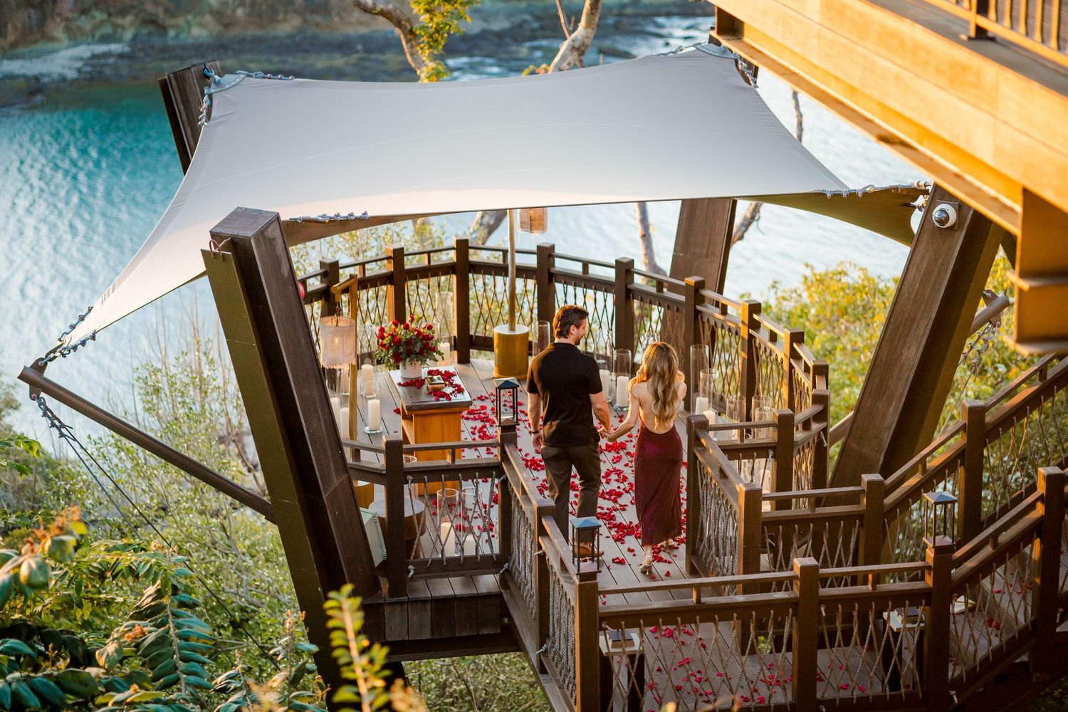 Sunset proposal setup at NIDO for a romantic engagement celebration at Nekajui in Peninsula Papagayo.