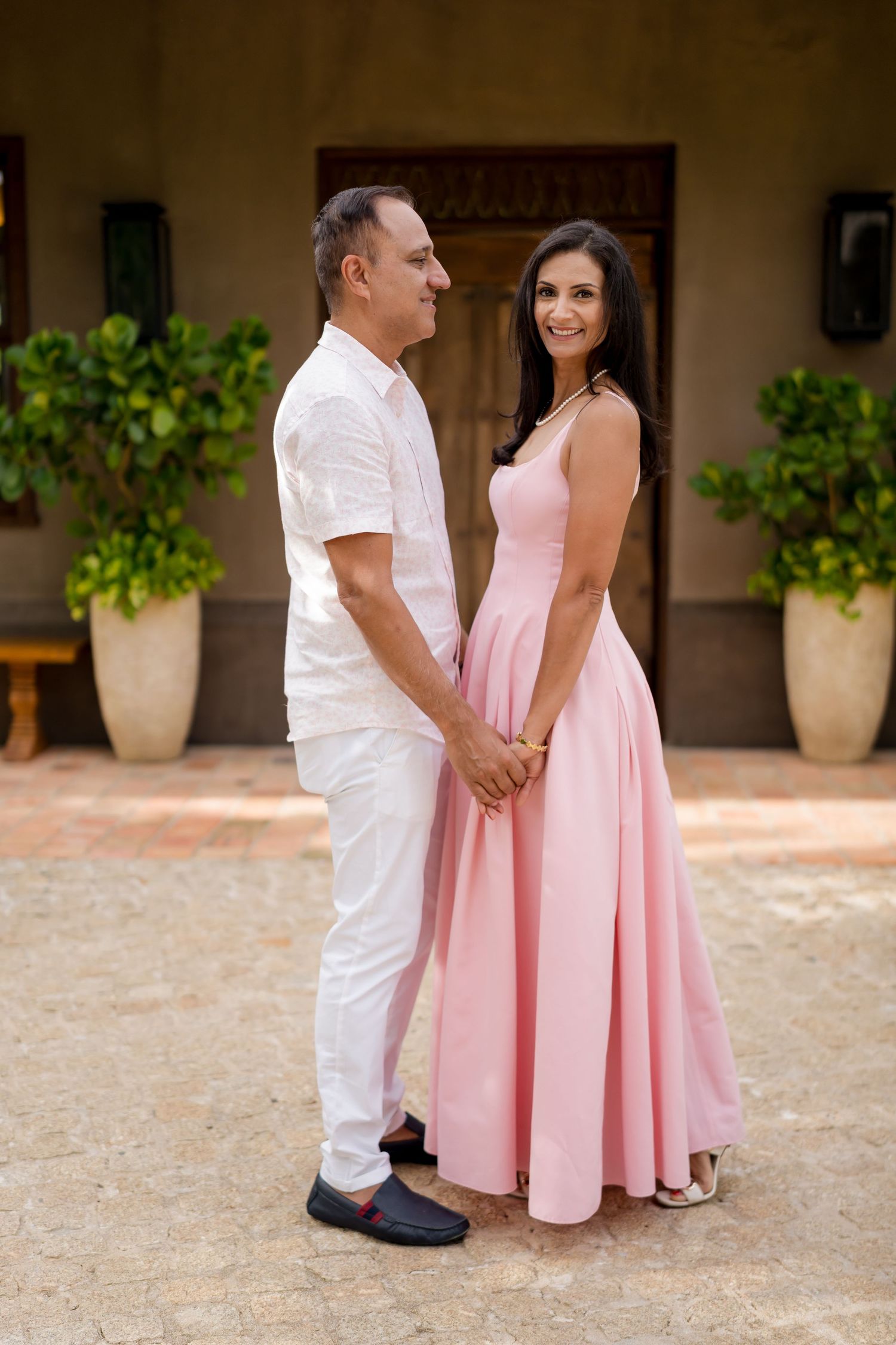 Couple photographed together at Nekajui, a Ritz-Carlton Reserve in Peninsula Papagayo, during their Costa Rica family vacation.