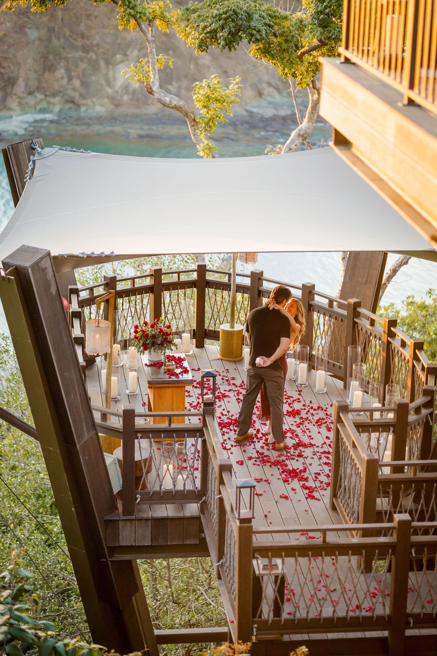 Newly engaged couple together at NIDO at Nekajui, a Ritz-Carlton Reserve in Costa Rica.
