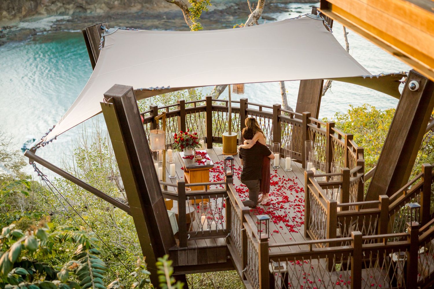 Romantic engagement dinner at Nido overlooking the ocean at Nekajui, a Ritz-Carlton Reserve in Peninsula Papagayo, Costa Rica.