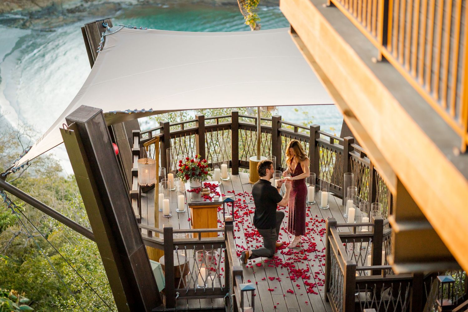 Romantic engagement dinner at Nido overlooking the ocean at Nekajui, a Ritz-Carlton Reserve in Peninsula Papagayo, Costa Rica.