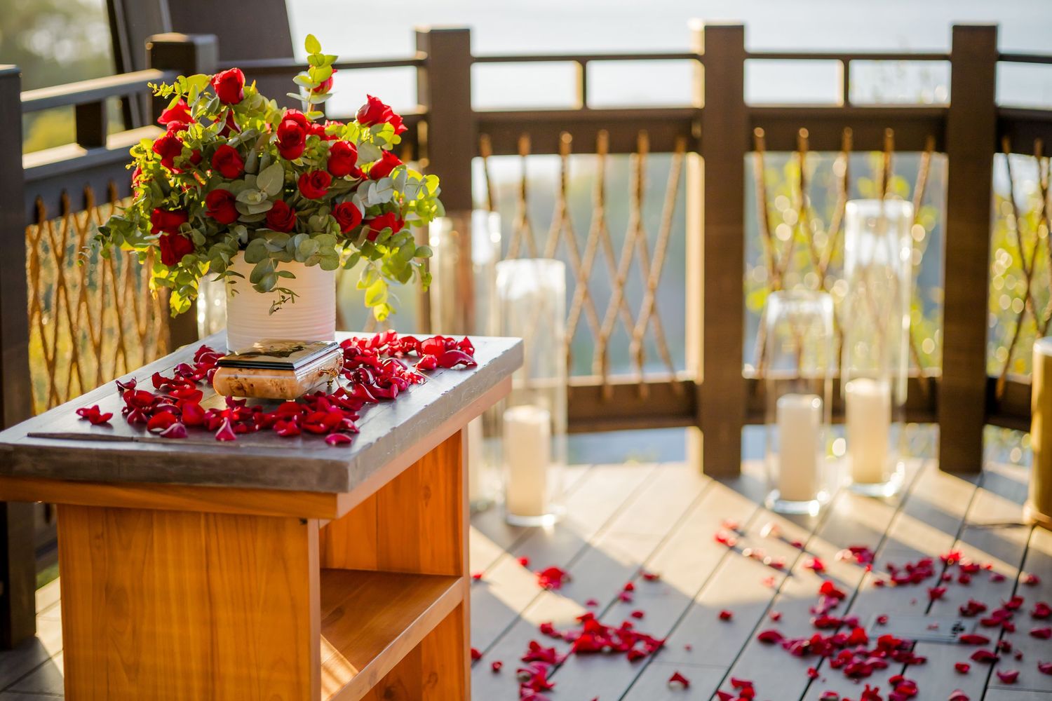 NIDO dining at Nekajui, a Ritz-Carlton Reserve, prepared for a romantic sunset engagement celebration.