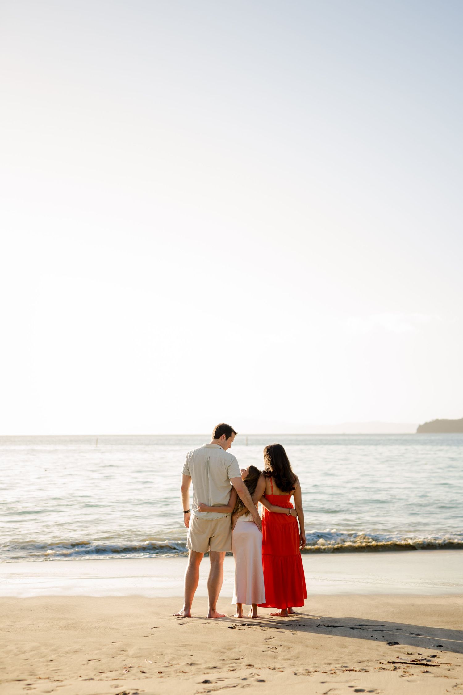 Family enjoying a sunset beach photography session in Peninsula Papagayo, Costa Rica.