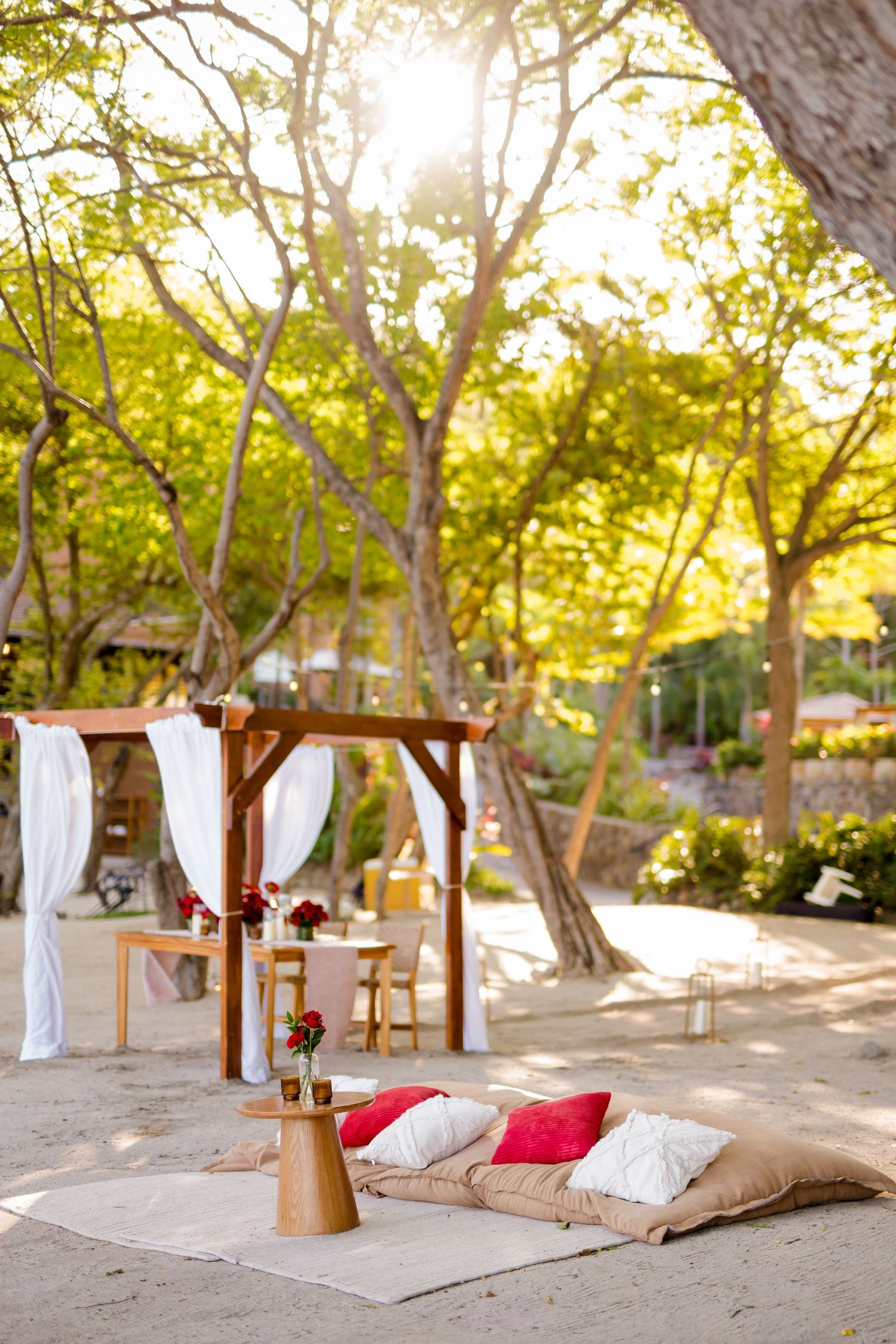 Romantic beach celebration setup beneath the trees at Andaz Costa Rica in Peninsula Papagayo.