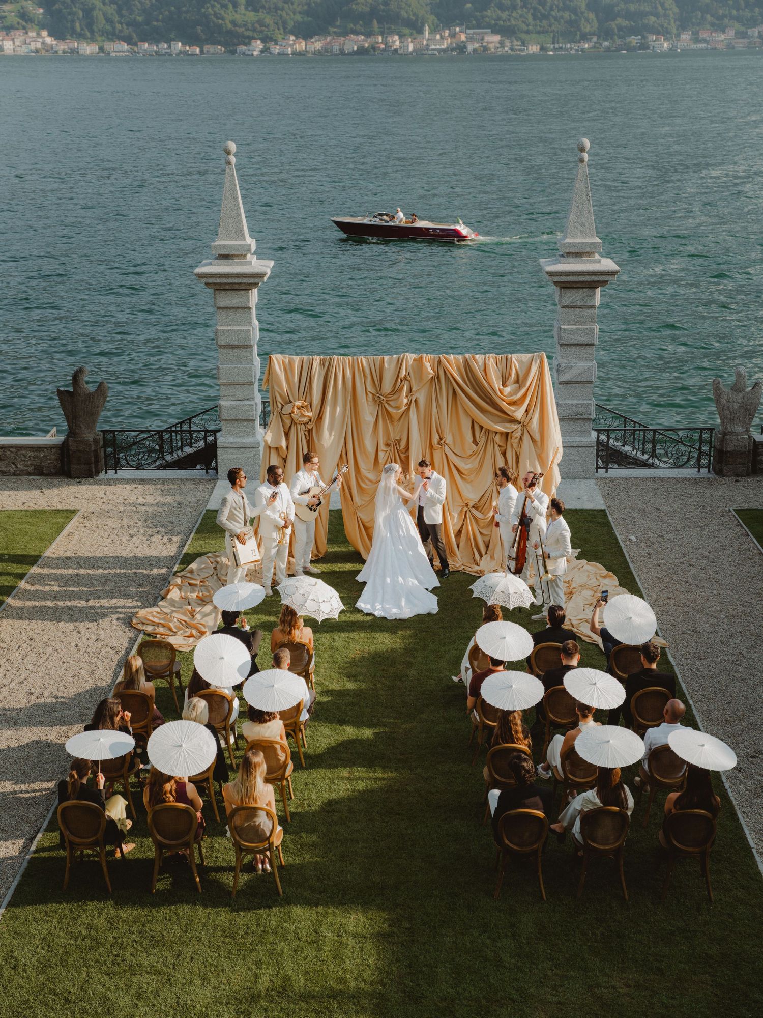 Elegant newlywed couple posing at Villa Balbiano on Lake Como, Italy