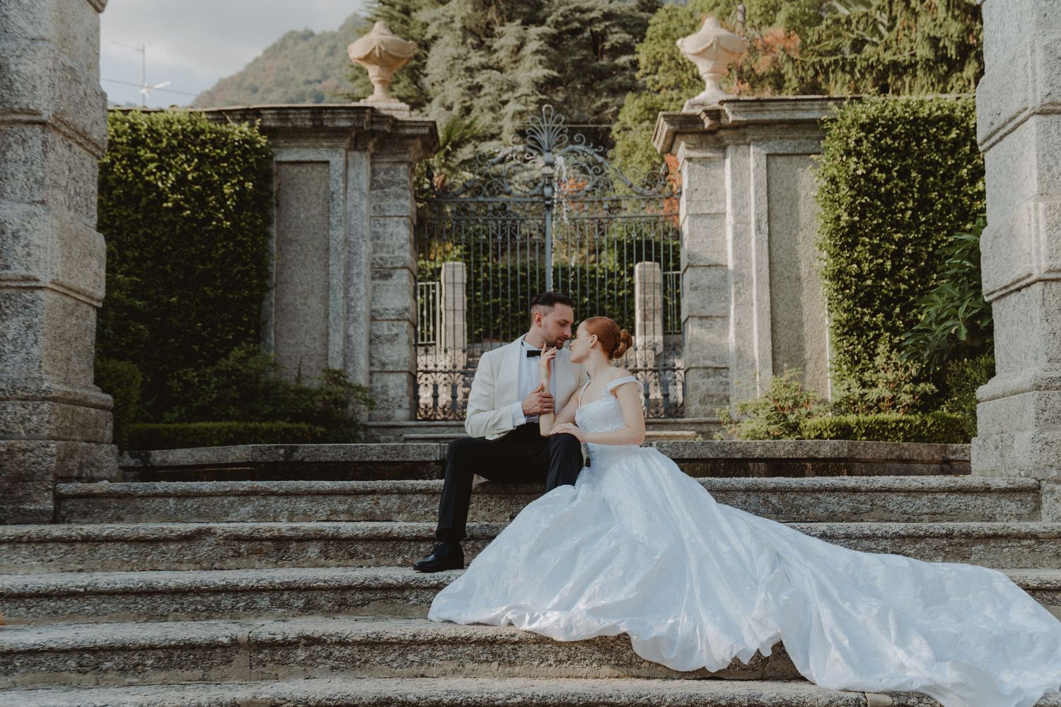 Timeless portrait of an elegant couple overlooking Lake Como