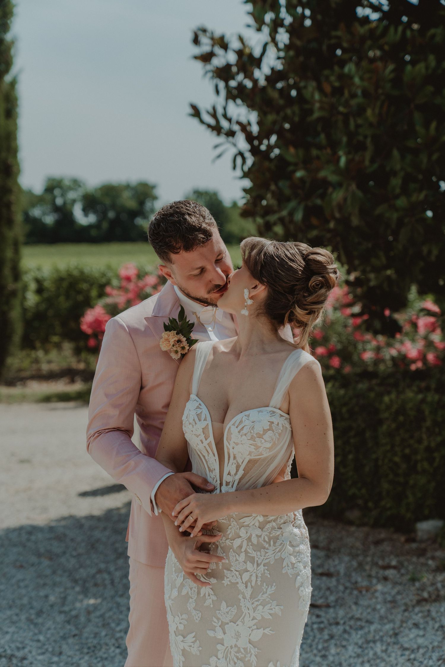 International newlywed couple sharing an intimate moment just before their first kiss.