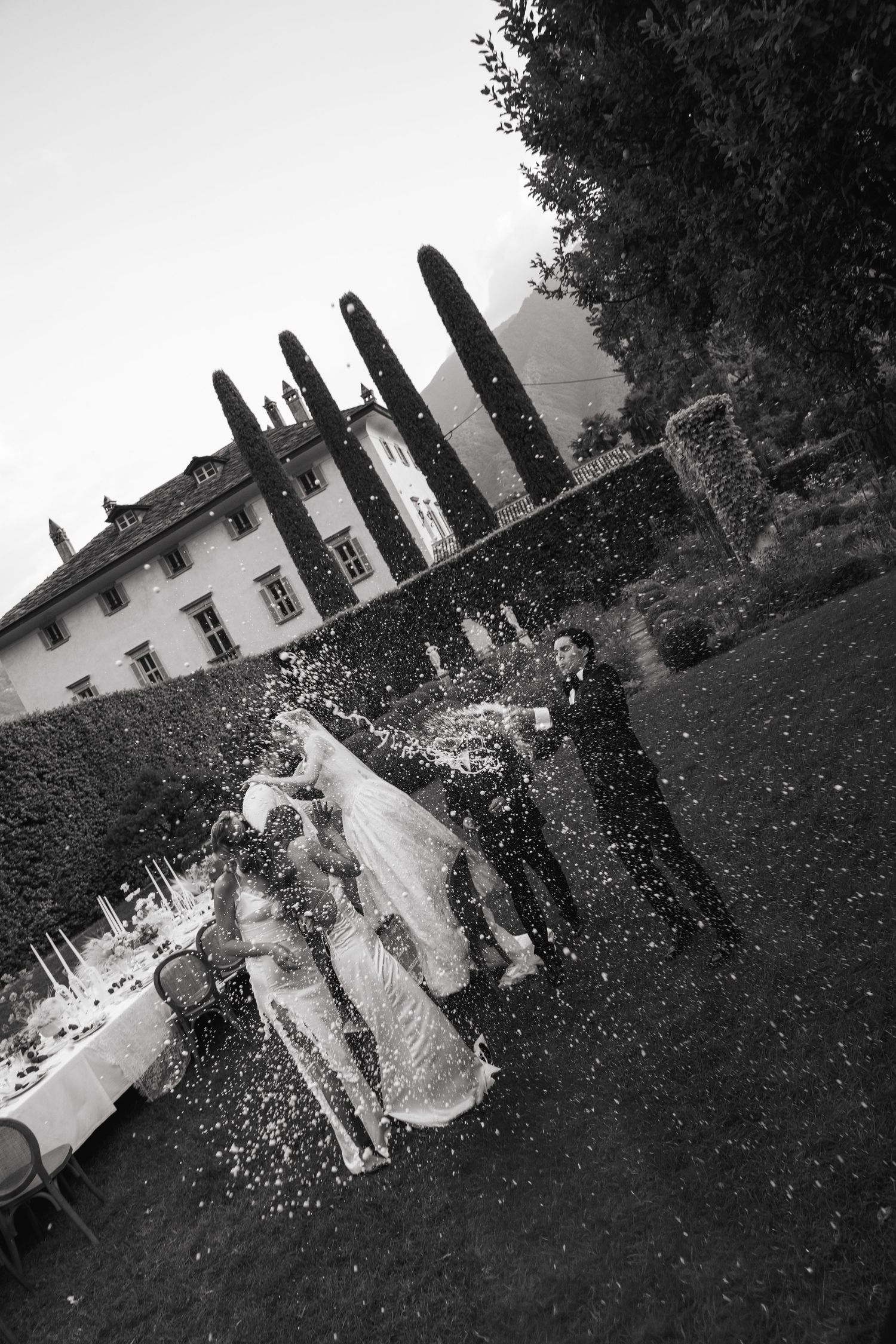 Newlyweds celebrating with friends and family at Villa Balbiano