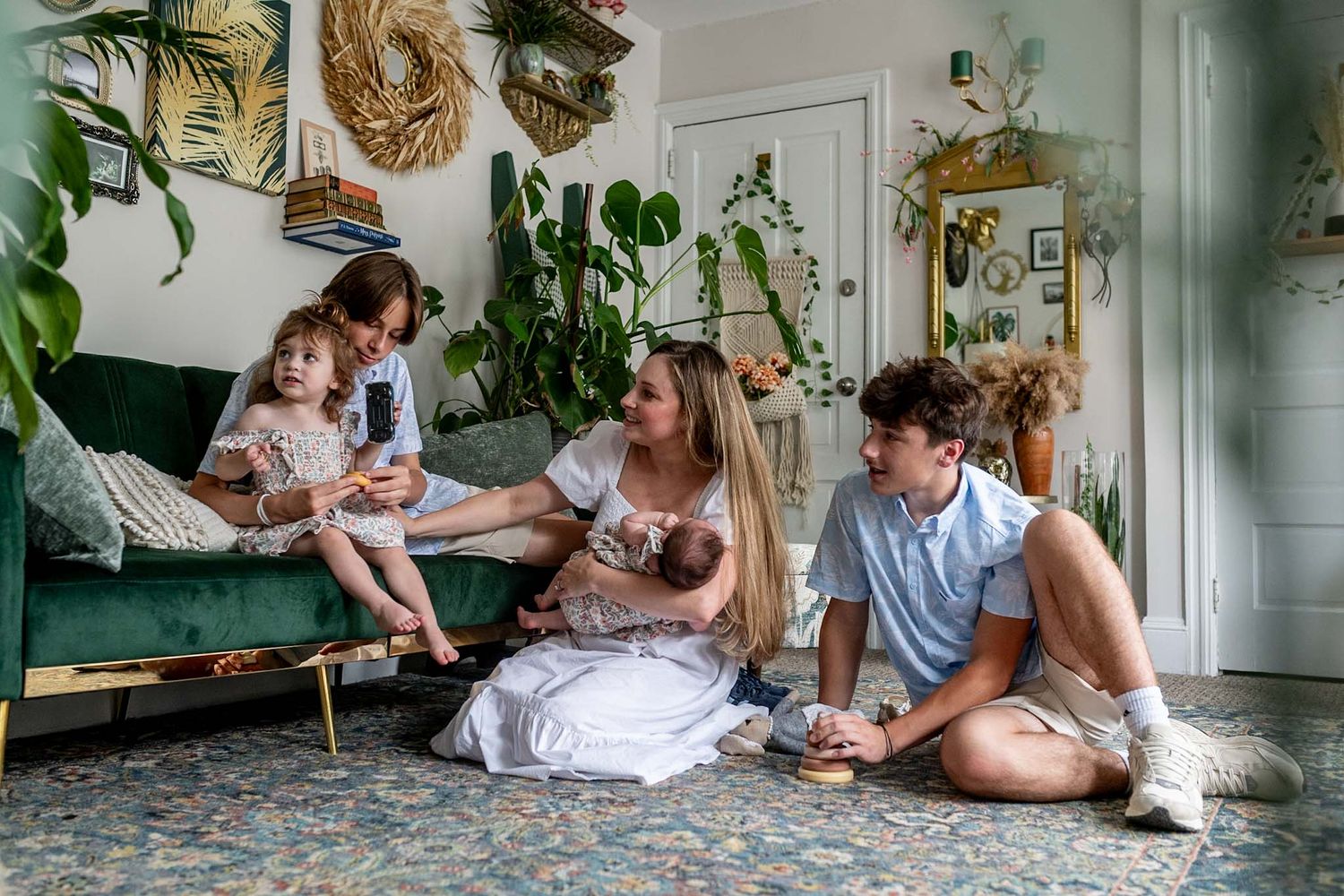 A series of candid shots showing joyful interactions on a patterned floor with indoor plants.