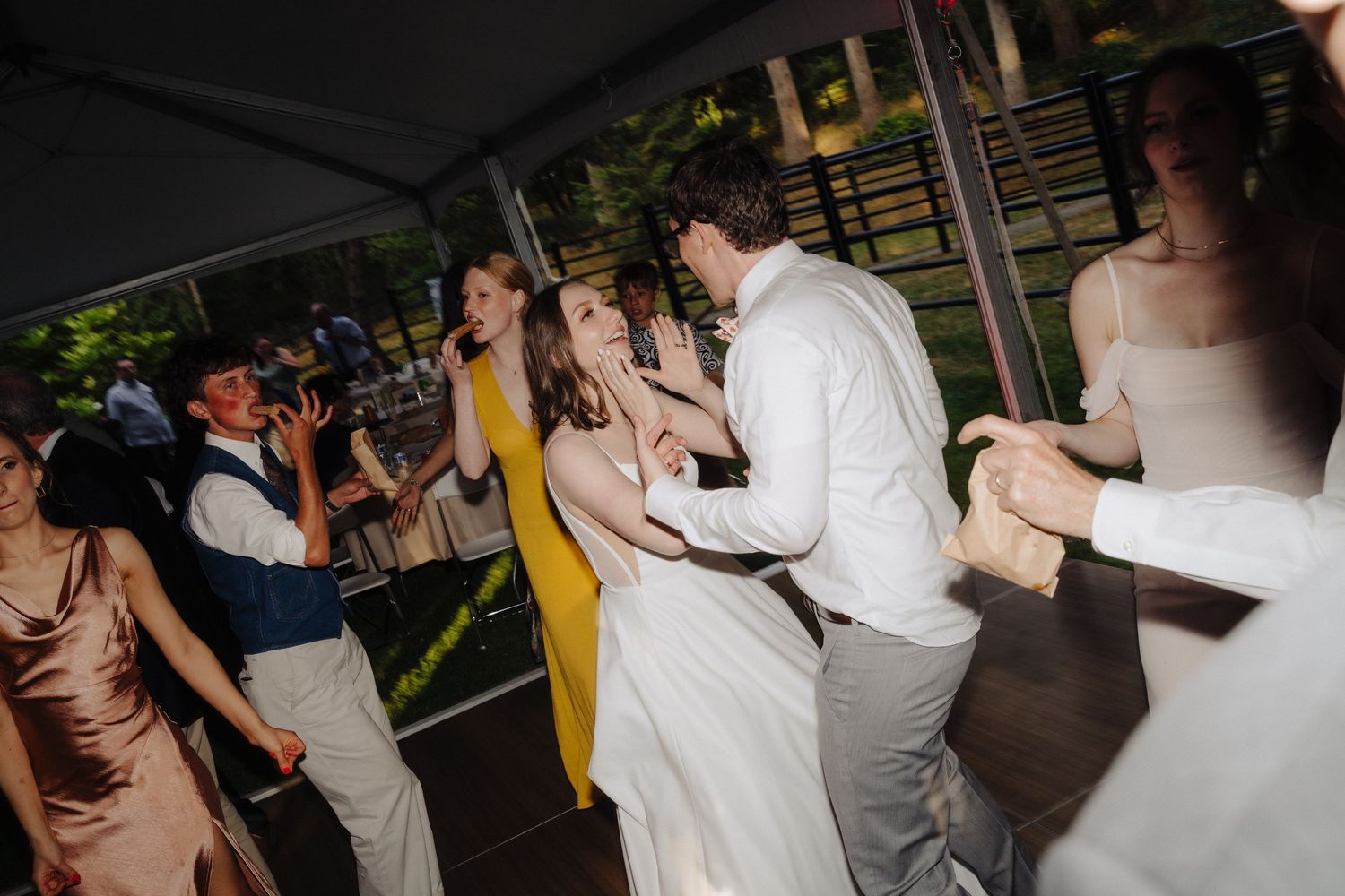 Lively wedding reception dance floor moments captured in a series of candid shots.
