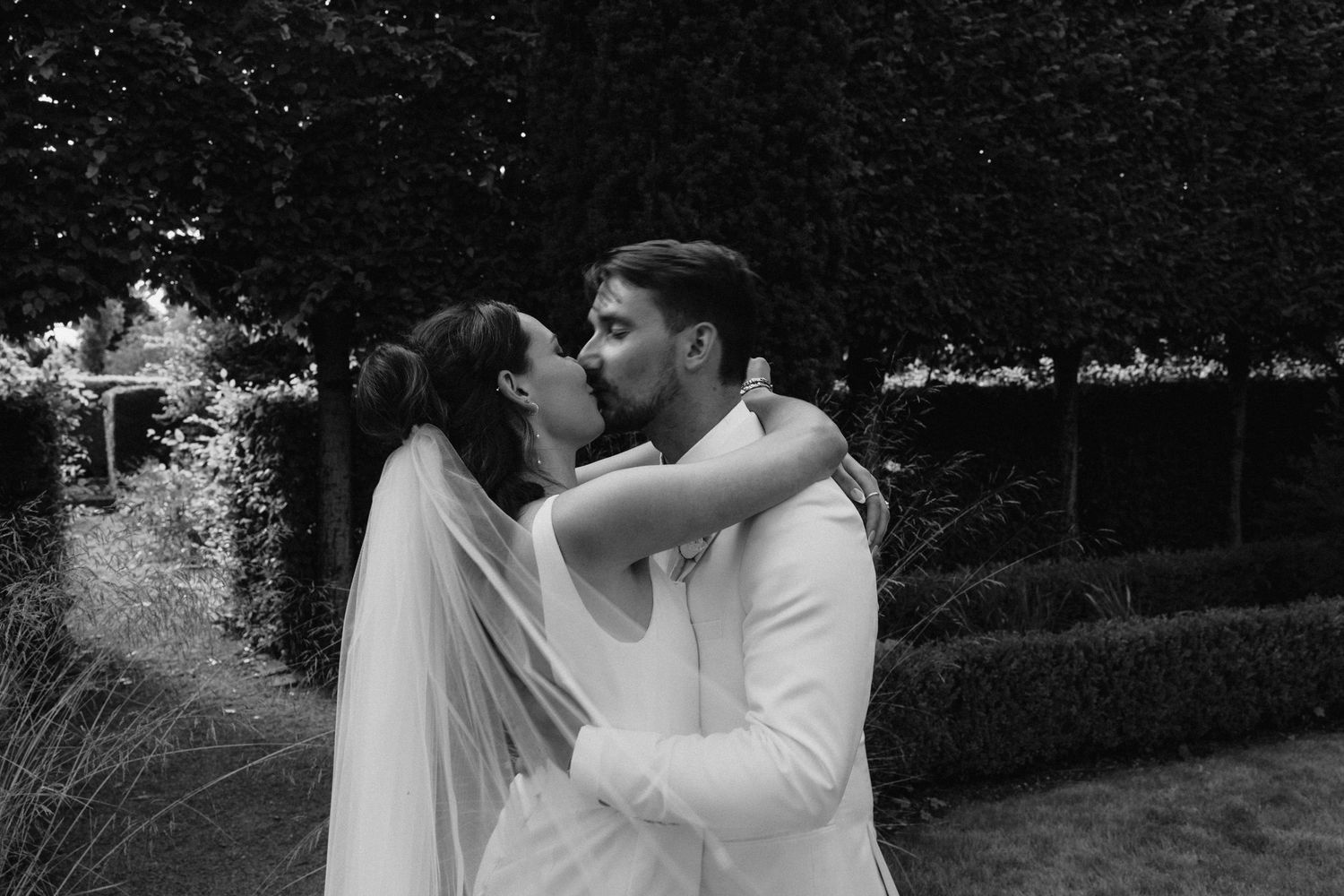 Intimate wedding moments captured in black and white photography.