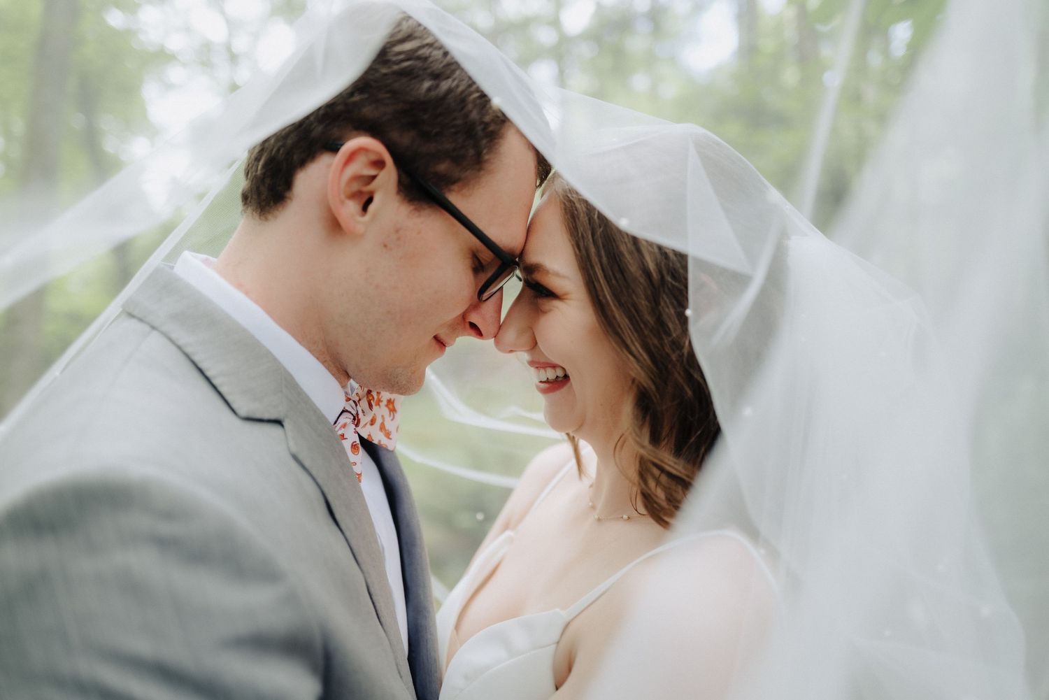 Tender close-up wedding portraits with soft natural lighting.