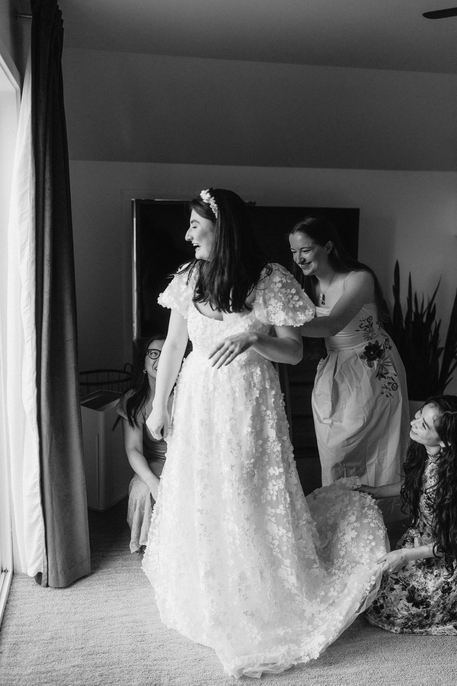 A series of black and white photos showing the process of getting ready for a wedding with white dresses.
