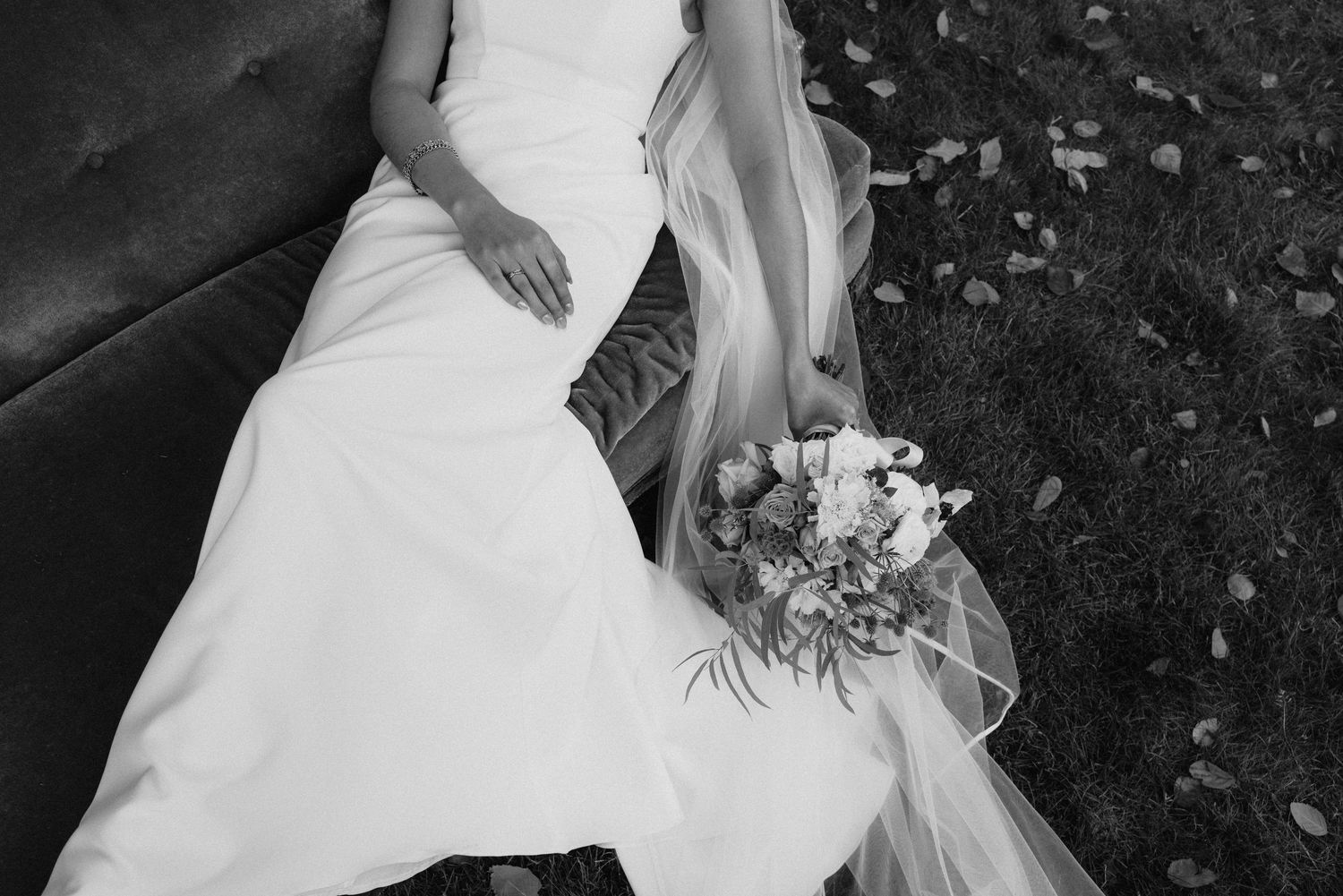 Black and white wedding portraits showing intimate moments between the couple in a garden setting.