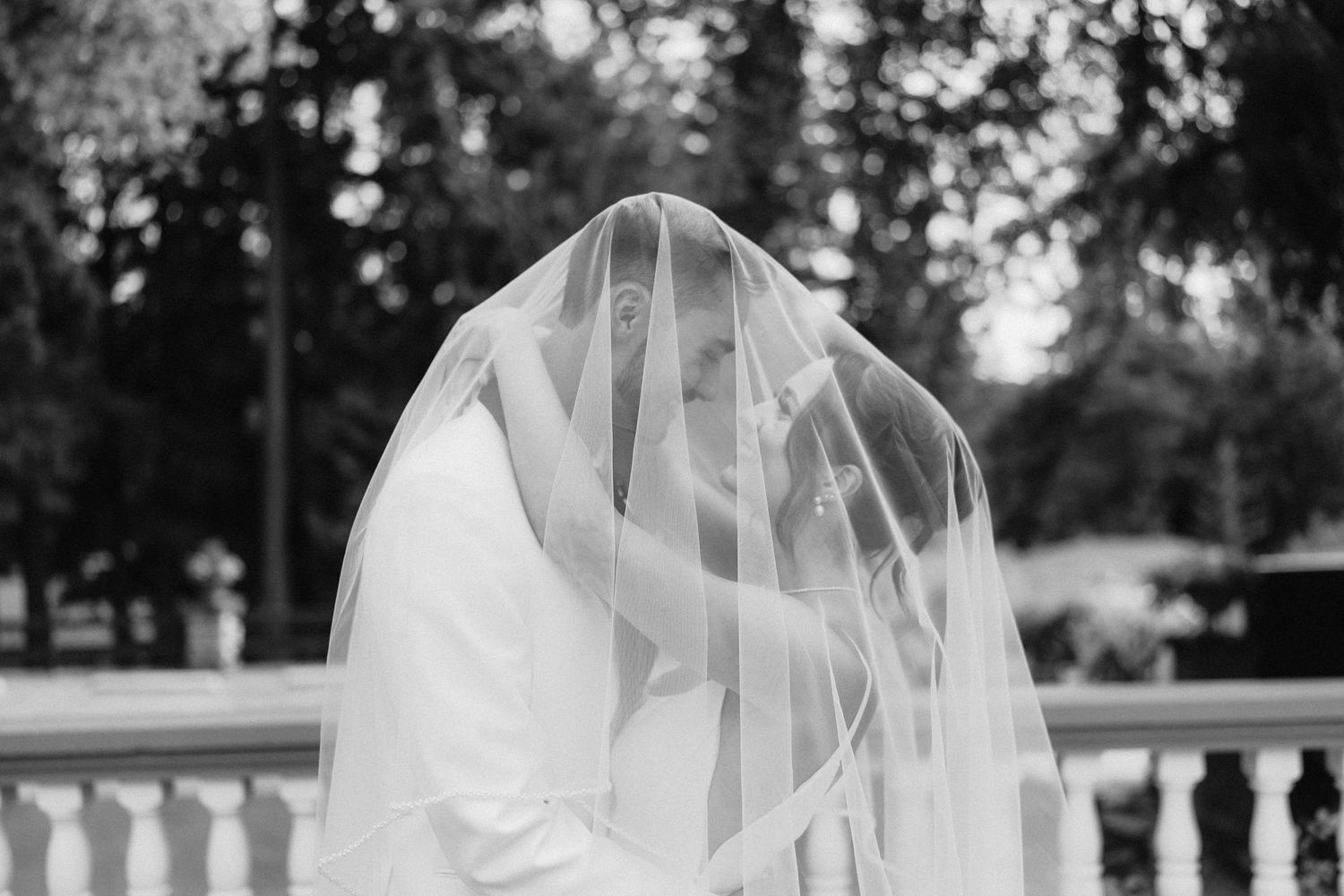 Series of black and white veil photos with soft natural lighting outdoors.