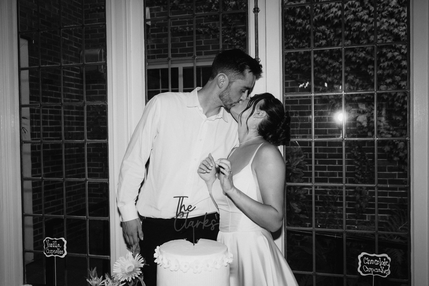 Black and white photos capturing candid moments during a wedding celebration.