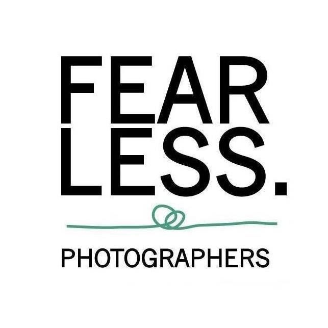 Black and white logos for Fear Less and Fearless photographers arranged in a minimalist design.