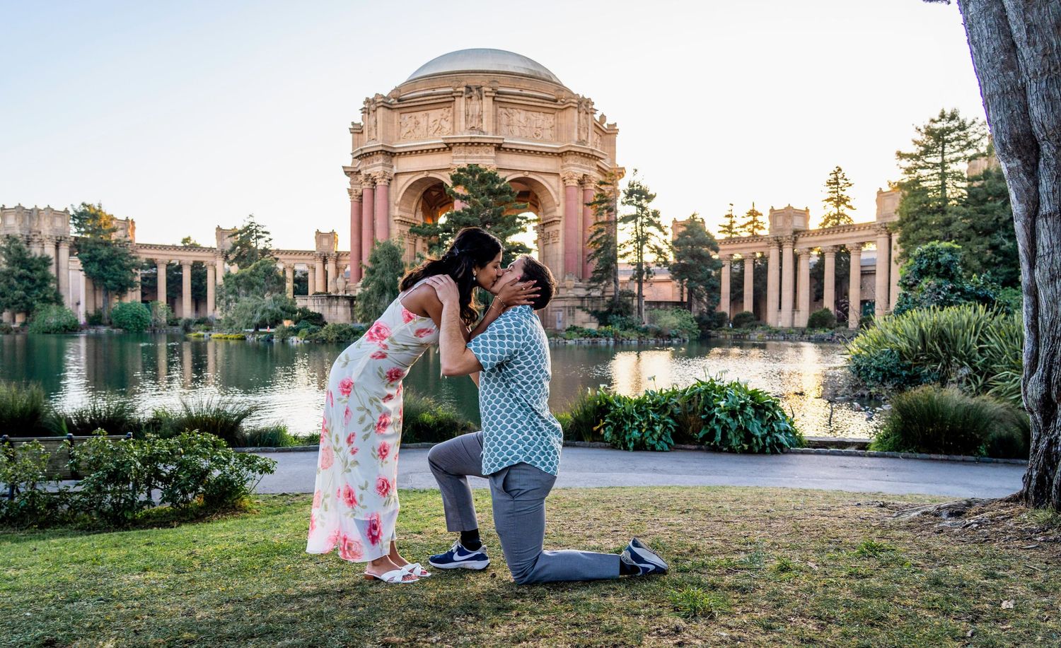A celebratory moment after a proposal at the Palace of Fine Arts in San Francisco.