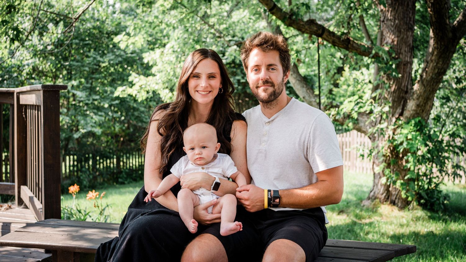 Joyful family moments shared in a lush green outdoor setting on a sunny day.