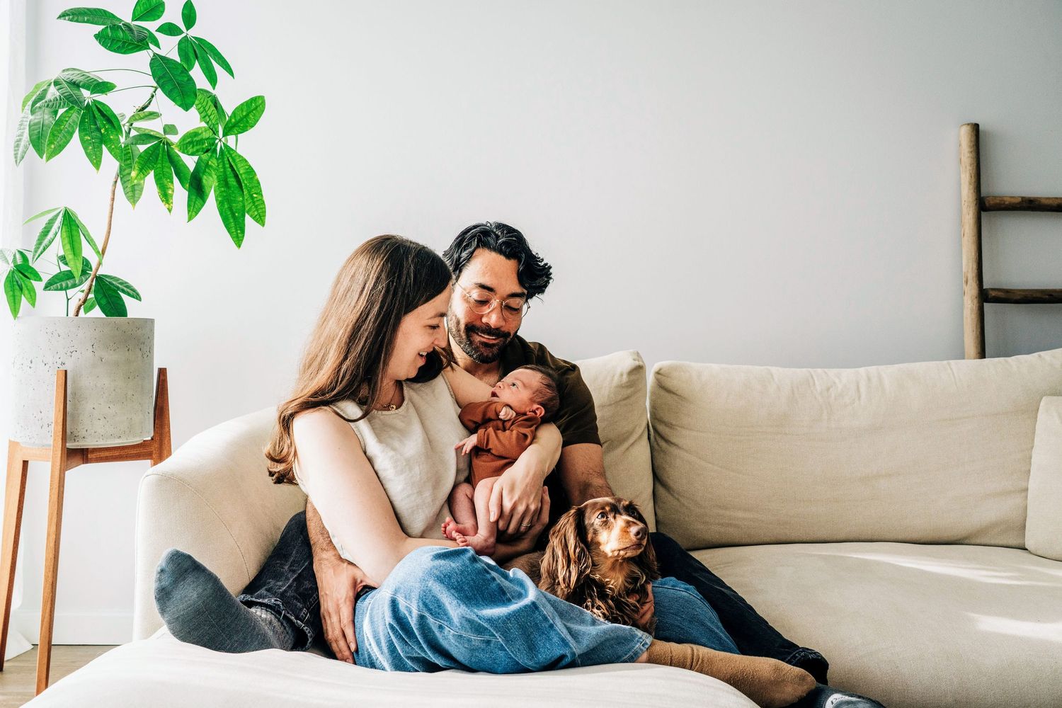 A series of candid lifestyle photos showing tender moments on a light-colored couch.