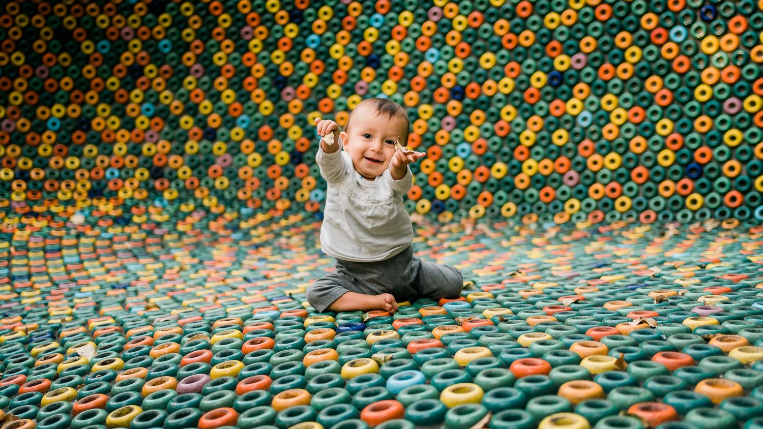Colorful mosaic pattern sequence showing playful moments and movement.