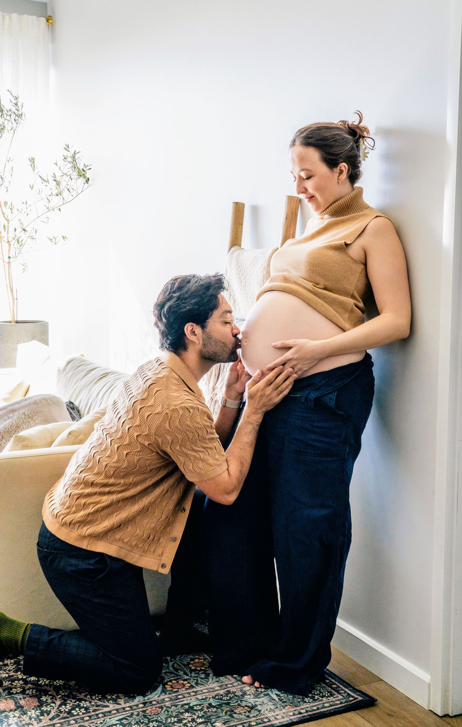 A sequence of maternity photos showing tender moments between an expectant couple.