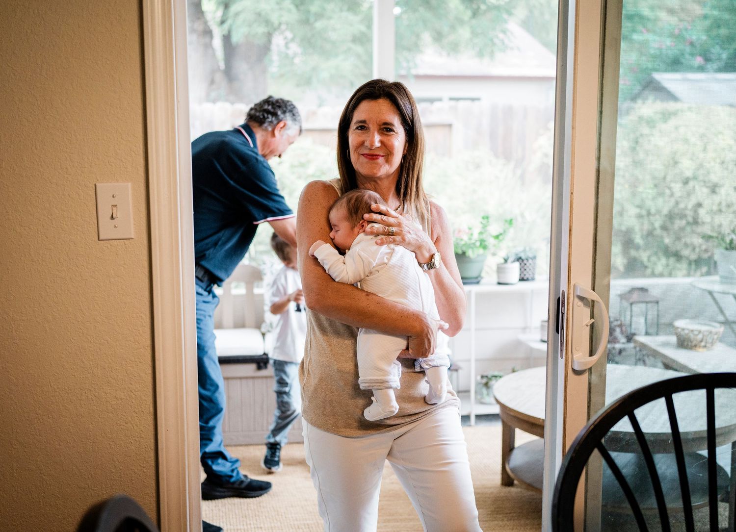 Candid indoor lifestyle photography session with soft natural lighting.