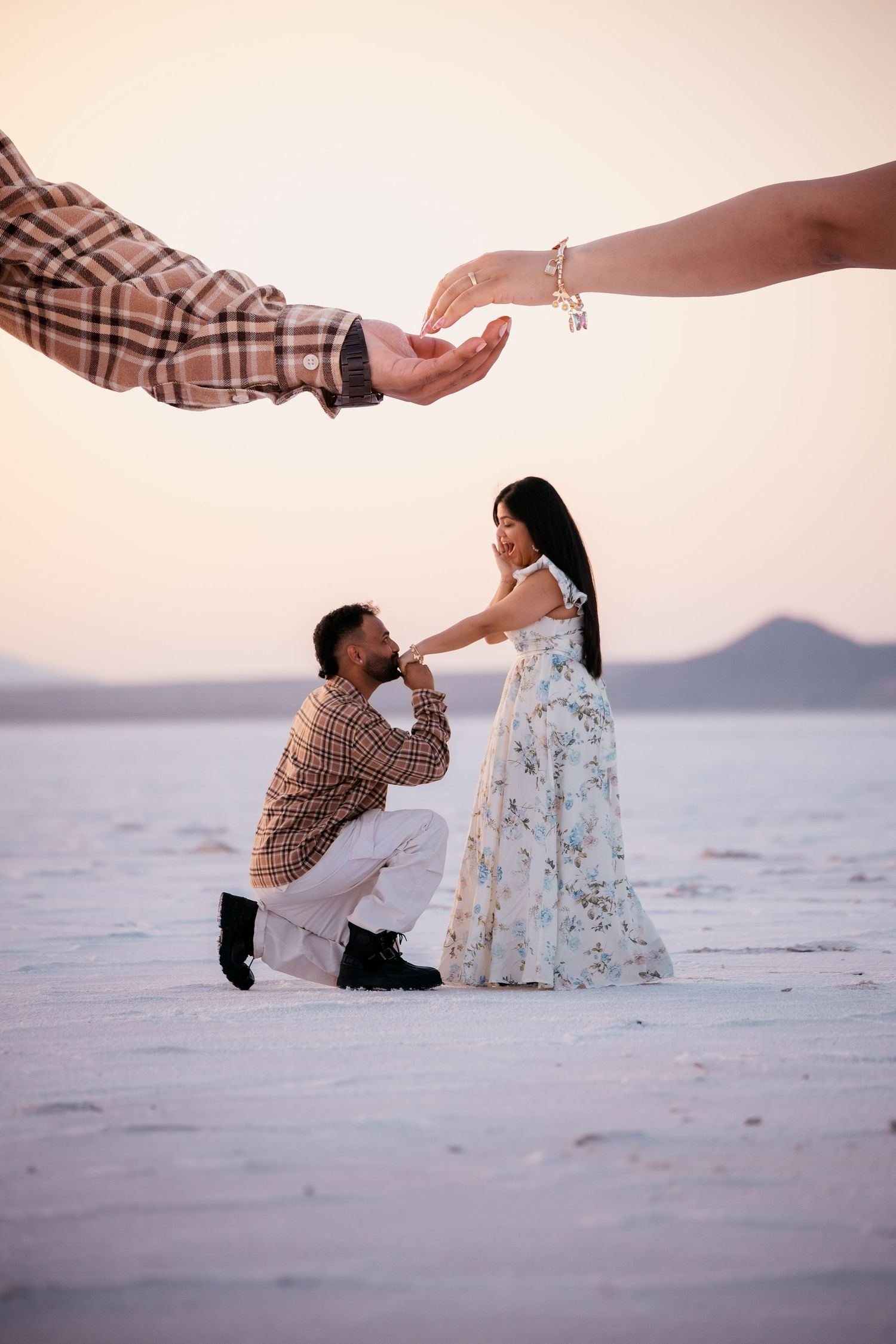 Four sequential photos show a creative forced perspective shot of a person appearing to fall backwards on a salt flat.