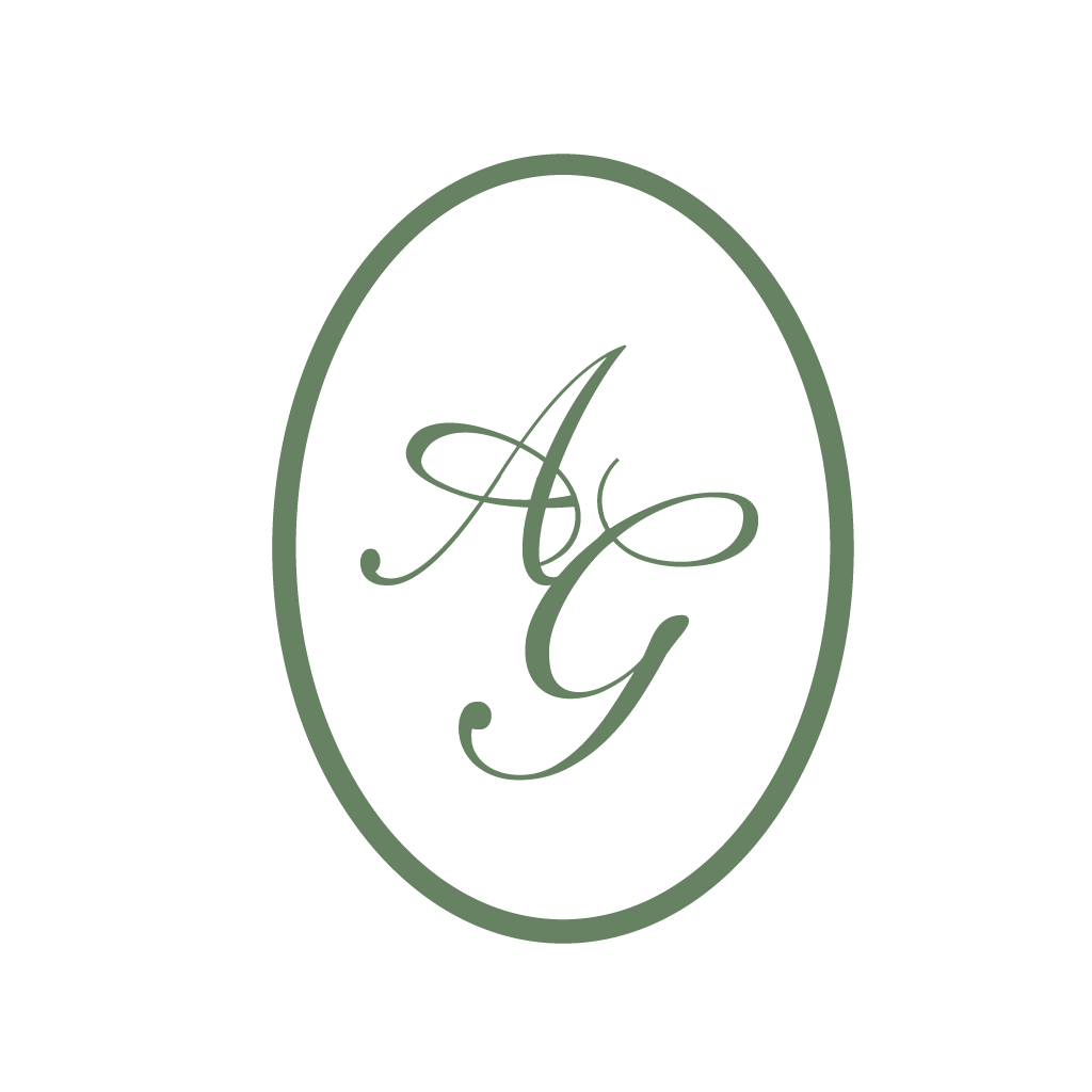 Green decorative circular monogram letters arranged in a horizontal row on white background.