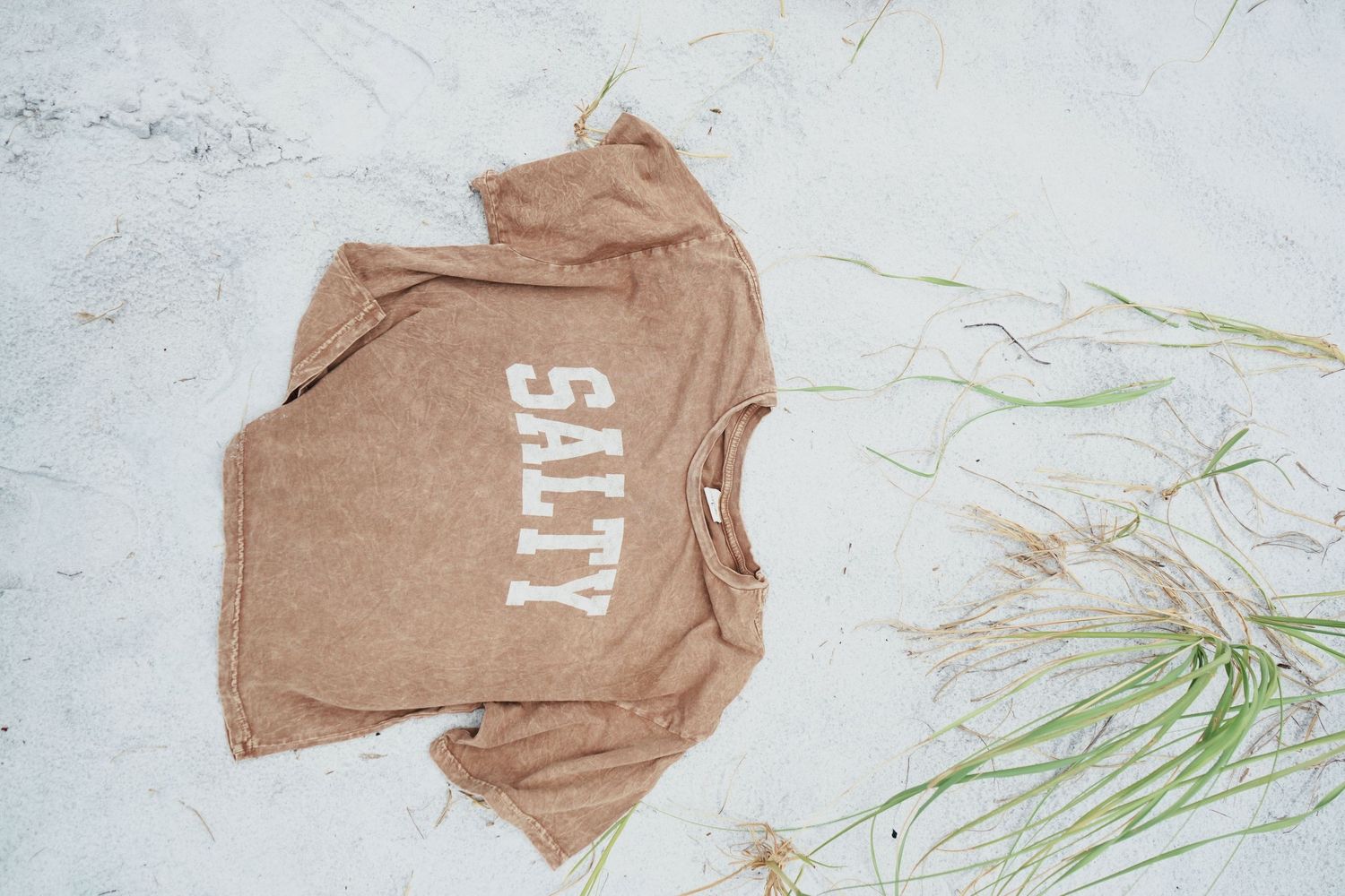 A brown t-shirt with 