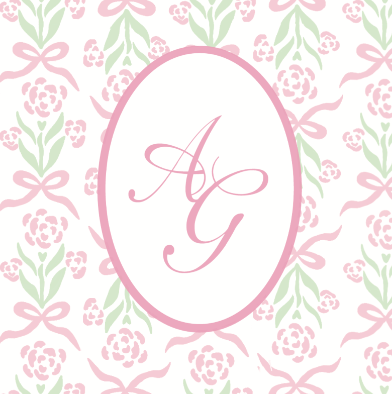 Pink monogram letters AG in an oval frame surrounded by delicate pink and green floral pattern background.